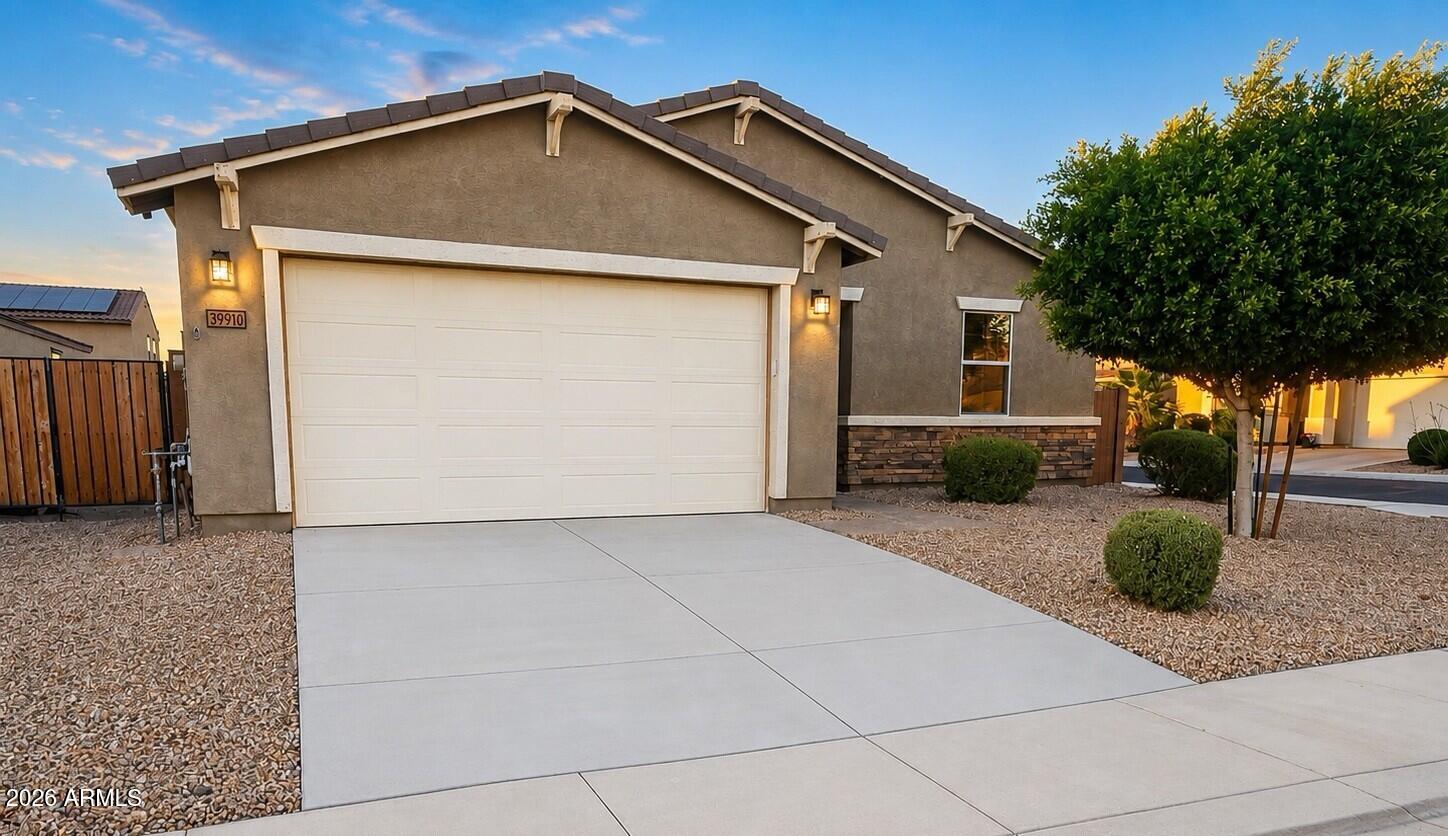 Welcome to this beautifully updated 4-bedroom, 2.75-bath home in the growing community of Maricopa. Thoughtfully maintained and upgraded, this home offers comfort, efficiency, and stylish living throughout. Inside, you'll find upgraded flooring in three of the four bedrooms. The spacious primary suite features an upgraded walk-in shower, creating a relaxing retreat. The kitchen has been enhanced with an upgraded farmhouse sink. One of the secondary bedrooms is equipped with its own mini-split system with solar on it, offering added comfort and energy efficiency. Additional upgrades include a tankless water heater, reverse osmosis system, and water softener. With modern upgrades, energy-efficient features, this home is ready for its next owner!