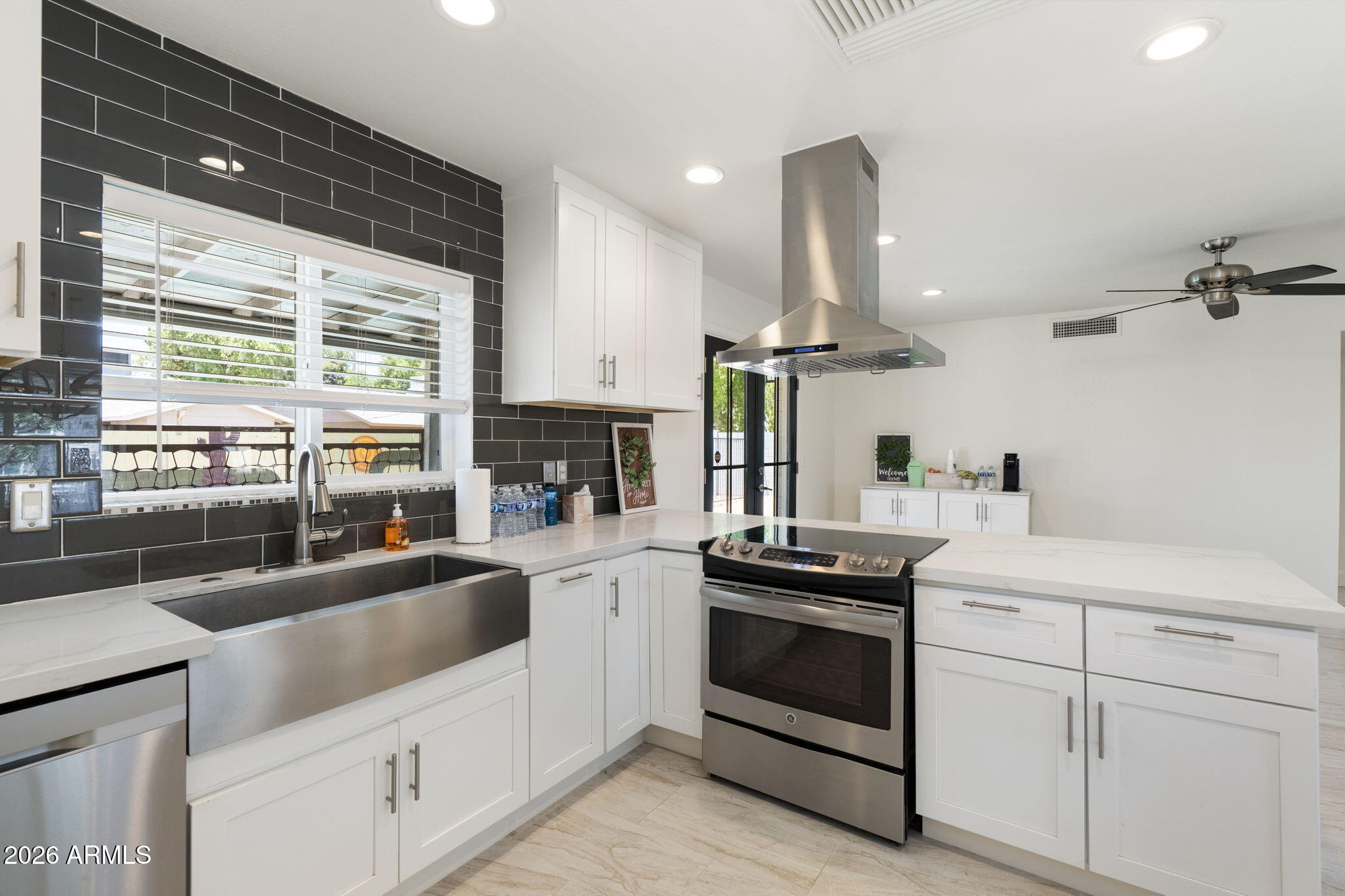 This one checks all the boxes! ✓Updated ✓No HOA ✓Level, tiled floors ✓Gated Pool ✓Cul-de-sac ✓Not a flip. This 3 bed 2 bath property has all dual pane windows, floors leveled out and re-tiled (no sunken living rooms here), open-concept kitchen with stainless steel appliances, vent hood, quartz counters, and updated cabinets. LED lights, updated fans, tiled backsplash, walk-in tiled shower, dual vanities,  and interior laundry round out the interior. Open your French doors to a fully fenced and crystal clear swimming pool and fun hand-painted murals waiting for you to jump in and cool off from this hot hot heat. Plenty of space for a garden, play area, or dog area as well as 2 large storage sheds. It's walking distance to K-12 schools with Dobson High just north of the home, and Summit Academy, an IB focused school, just across the canal to the south. Speaking of the canal, if you like to walk or bike, hop on the canal and take the Sun Circle Trail from the nearby Palo Verde Park, a series of interconnected canals and bike paths that can take you all around the Valley with over 300 miles of trails. Check out this well loved and well-updated house close to Chandler employers but Mesa taxes in a clean, well-kept neighborhood. Don't miss it!