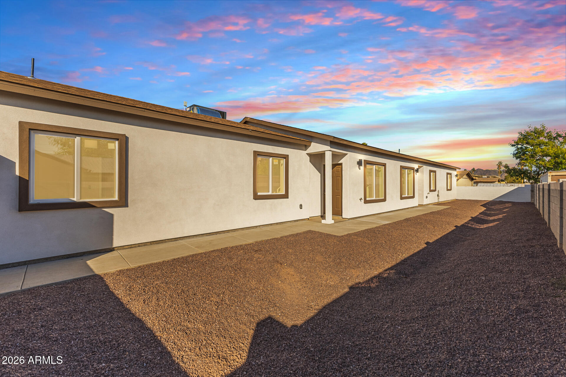 NEW CONSTRUCTION with warranties and immediate income! APPLIANCE PACKAGE! Take advantage of this fantastic investment opportunity! This duplex welcomes you with a carport, an extended driveway, and a low-care front yard. Both units boast an open layout with high ceilings, a soothing palette, recessed lighting, and attractive wood-look flooring for a timeless appeal. The kitchens feature sleek quartz counters, crisp white shaker cabinetry with crown molding, stainless steel appliances, and an island with a breakfast bar for casual dining. All bedrooms are cozy and well-sized, offering a private retreat for all inhabitants. You'll also find a washer/dryer combo for easy laundry. Conveniently located close to bus stops, restaurants, and shopping options.