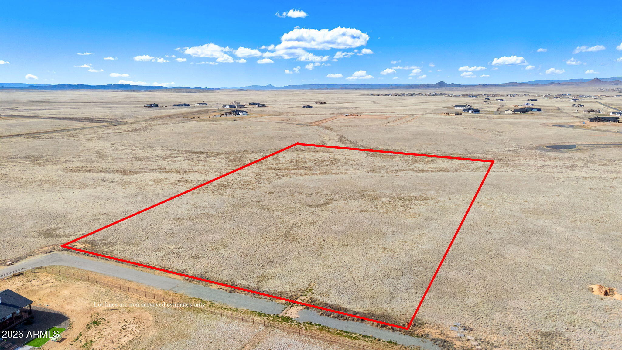 Set behind the gates of the desirable Copperfield community, this 8-acre parcel offers privacy, convenience, and breathtaking natural beauty. Paved access leads directly to the property with electric available at the lot line, making it ready for your custom home. Enjoy sweeping panoramic views of Granite Mountain, the Bradshaw Mountains, and Prescott Valley's high-desert landscape. The expansive acreage provides plenty of room for a private estate, guest house, or hobby retreat while maintaining open space and serenity. Located just minutes from town, you'll enjoy easy access to shopping, dining, medical services, and outdoor recreation while returning home to the peace and security of a gated community. Lot can be split into two 4-acre parcels.