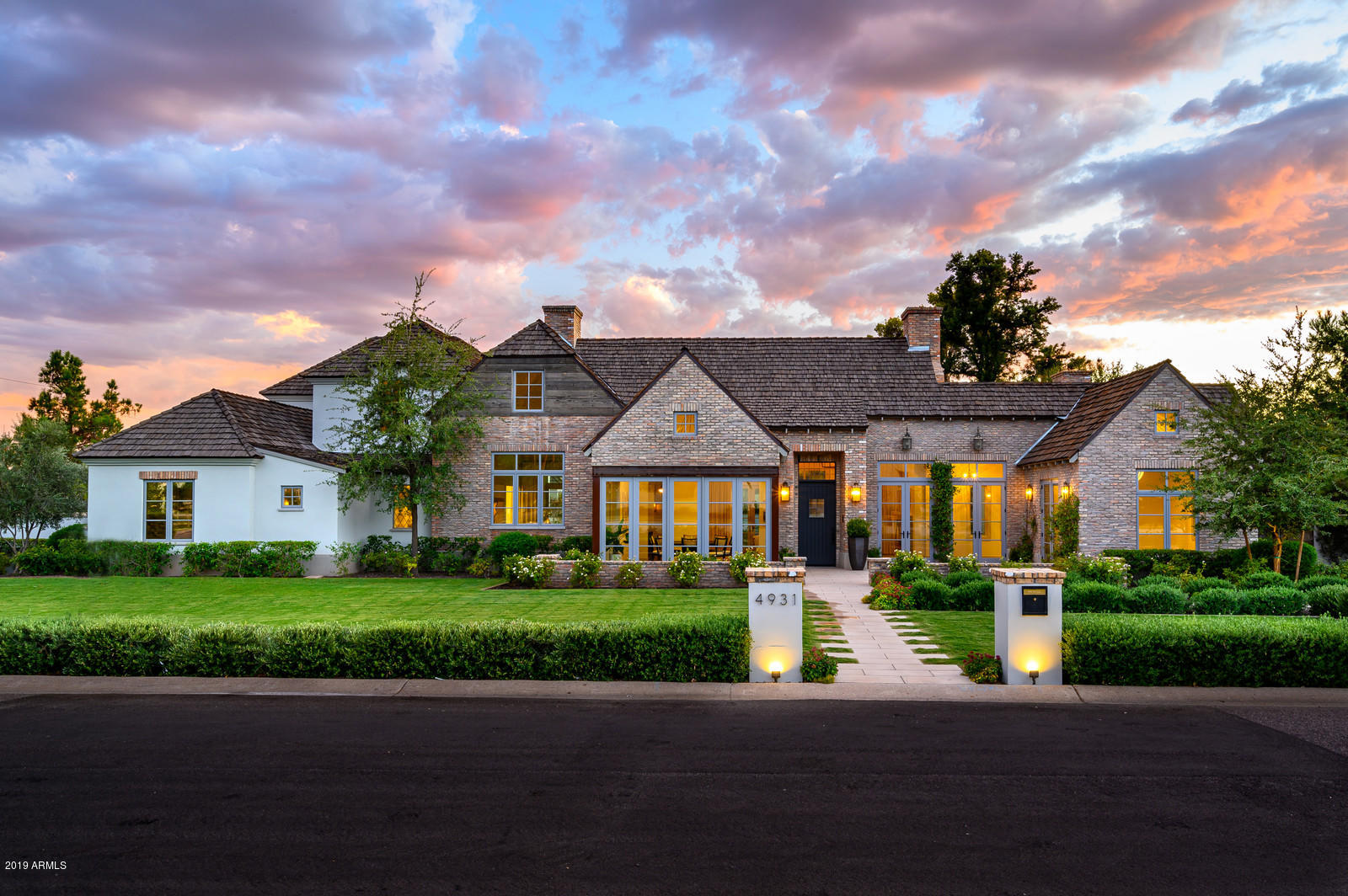 A one of a kind estate, in a one of a kind location at the epicenter of Arcadia! From the minute you arrive, you will be mesmerized by the breathtaking architecture delivered by the one and only Vista General. The thoughtfulness begins with a flawless 6,251 sf floor plan that offers every special feature you can think of. The floor plan starts with 4 en suite bedrooms, 6.5 bathrooms, and continues with an office, formal dining and large game room/loft which all feature spectacular views of Camelback Mtn. The home sits on nearly 2/3 of an acre and features a stunning, ultra-private backyard filled with lush, mature landscaping, pool house, pool, hot tub, and most important NO visible power lines. An electric privately gated 3 car garage and large parking space for a boat, RV or more toys complete this one of a kind home. This is your opportunity to purchase what feels like your custom home, yet ready for immediate move-in before the holidays arrive.