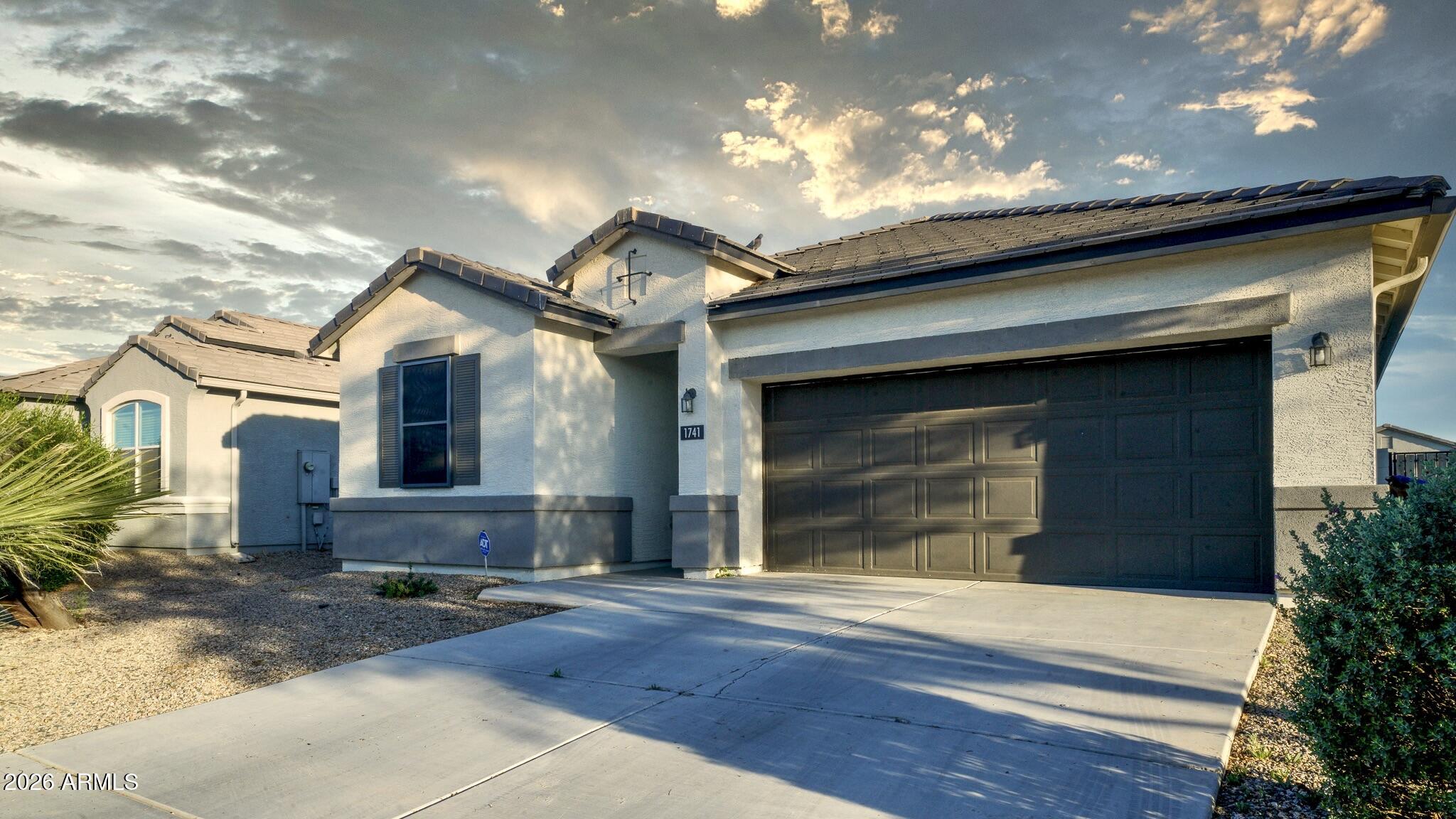 Beautiful home, Great Floorplan! Primary bedroom on one side, all other bedrooms are really separate, on the other side of the home. Many nice and practical upgrades.   Superior protection, Boss security screens on all exterior doors and windows creating a safe and serene atmosphere. According to their website, Boss Security screens also block up to 66% of solar heat gain.  Warranty on screens is transferrable to new owner! Ceiling fans in all bedrooms and in living area. Tile in traffic areas, carpet in bedrooms. Professionally painted inside and on accent walls.