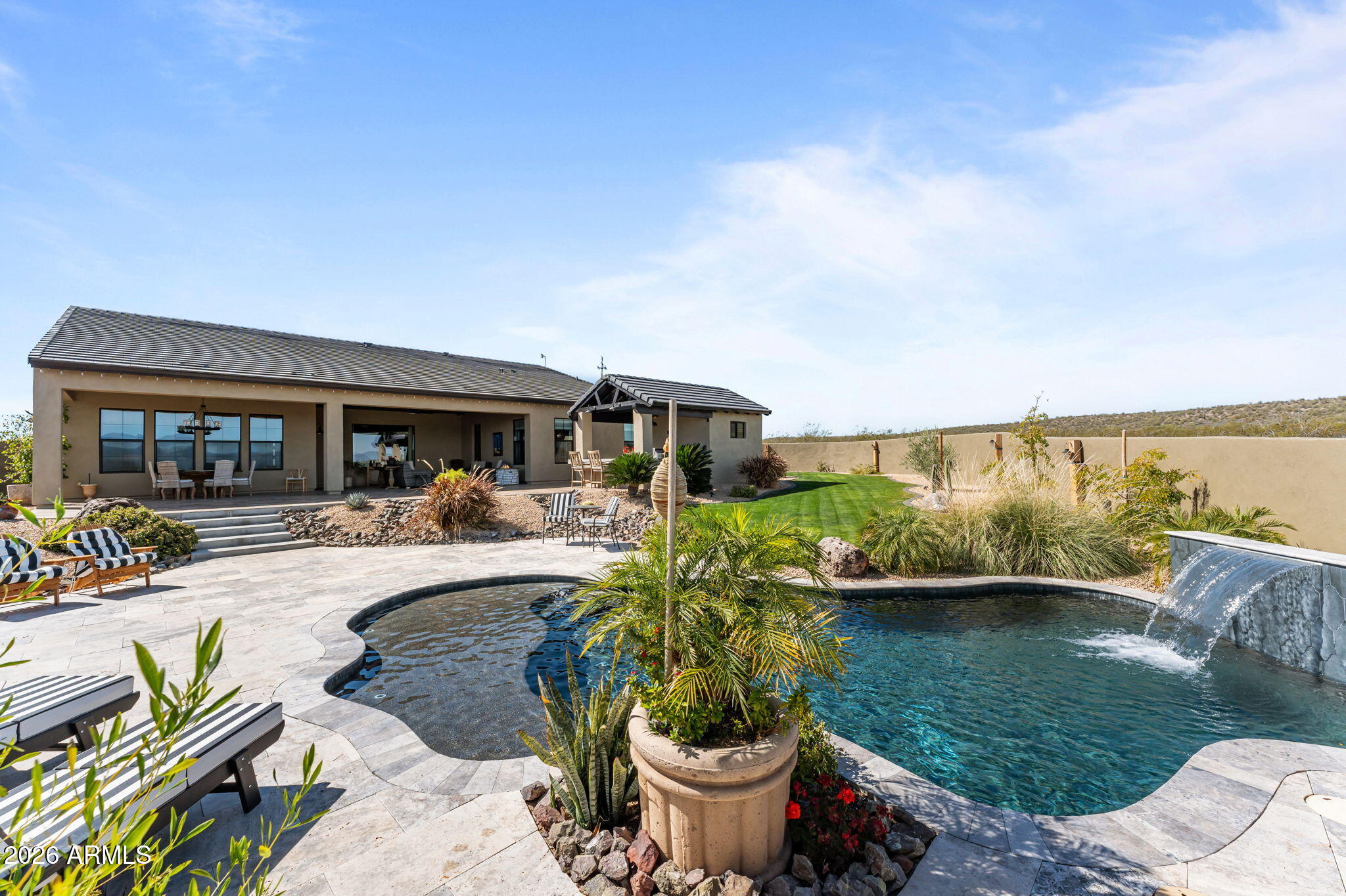 Views views views! Very special custom home nestled on a private lot in Listening Hills.  Entertainers delight, giving center stage to a gourmet kitchen with butlers pantry and huge island.  Not one detail overlooked in the well thought out interior design here.  Enjoy the freedom of stepping outside into your outdoor paradise with oversized patio, built in BBQ refreshing pool lush landscape and views galore! Additional highlights: solid wood built in cabinets throughout, 3 bedrooms each with its own bath. cozy powder room, master retreat with luxurious ensuite, relaxing tub and large shower, leading into a custom closet with no wasted space.  Also, don't miss the special trim work, designer paint, 6ft fridge/freezer, and ice machine, making this home a perfect place to make your home!