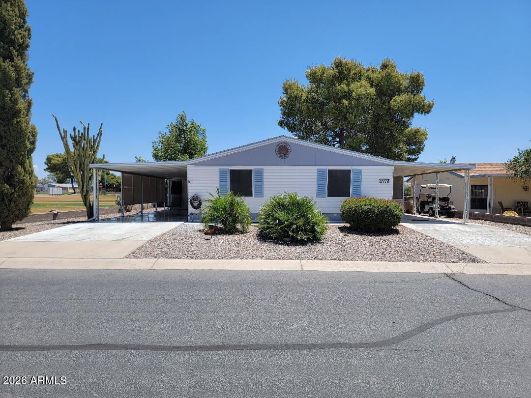 Motivated seller!! This is a lovely 2 bedroom 2 bath home on the golf course here in Florence Gardens, where you own the land!!The home offers pride of ownership! There is an Arizona room on the south side of home as well a a shed on the north side. Remodeled home with new flooring, cabinets and granite countertops, doors and new stainless appliances! There is a separate family room and living room as well as a dining room. This home has had a lot of work done to update the property and to be comfortable and stylish. Newer AC is 4 years old, Hot water heater is 2 years old, newer roof- 6 years old. Close to the clubhouse with pickle ball courts, heated pools and spas, golf course, craft rooms and more! Golf car can convey with full price offer.