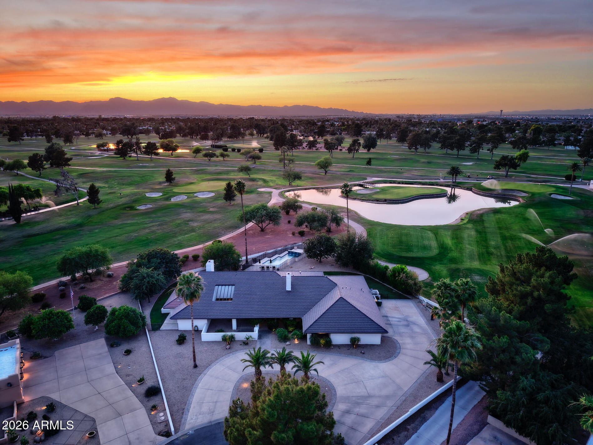 The Crown Jewel of Litchfield Park:
Discover the pinnacle of golf course living on this premier oversized cul-de-sac lot. This 4,000+ sq. ft. custom estate offers unrivaled 180-degree views of the historic Wigwam, featuring a front-row seat to the iconic 15th hole island green on the Blue Course. The experience begins in a grand atrium, leading to expansive living spaces with refinished hardwoods and a stone fireplace. The gourmet kitchen is a chef's dream with a Sub-Zero fridge and double ovens. Outside, luxury meets leisure with a sparkling swimming pool and an expansive covered patio with remote-controlled shades. With all its historic charm, this resort-style oasis offers a prestigious lifestyle in an unmatched Arizona setting!
