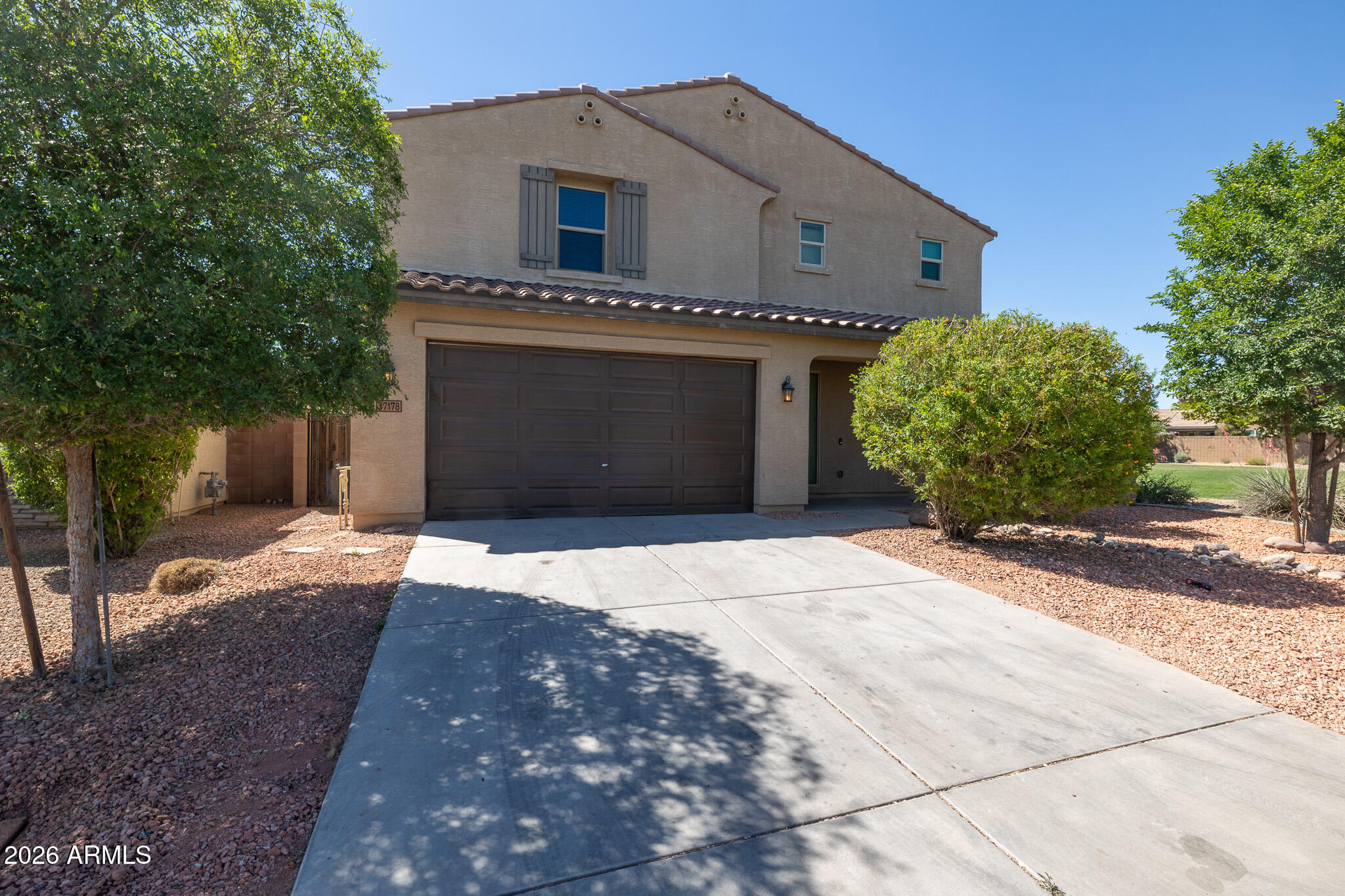 This large and spacious home in the heart of San Tan Valley is ready to be yours! At the front of the home you have an enclosed office space that has potential for use as an additional bedroom. Mud room ''area'' near the garage to drop your coat and boots as you come in. Kitchen / Dining / Living room all wide open with one another for excellent entertainment space. Backyard is small and easily manageable, ready for your future dream layouts.  The upstairs is complete with a loft and split floorplan. Laundry room upstairs right next to the master. Linen closets and bedrooms off to the other end. Master bathroom has an enclosed stand up shower, private linen closet, private toilet room, and spacious walk in closet. This is a must see!