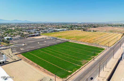 This large 6.49 acre raw land lot is unique with  zoning for industrial use. Situated in a prime location, this lot is located minutes away from State Farm Stadium and Westgate. With easy access to the Loop 101 freeway and Grand Ave this lot makes for a great potential business location!