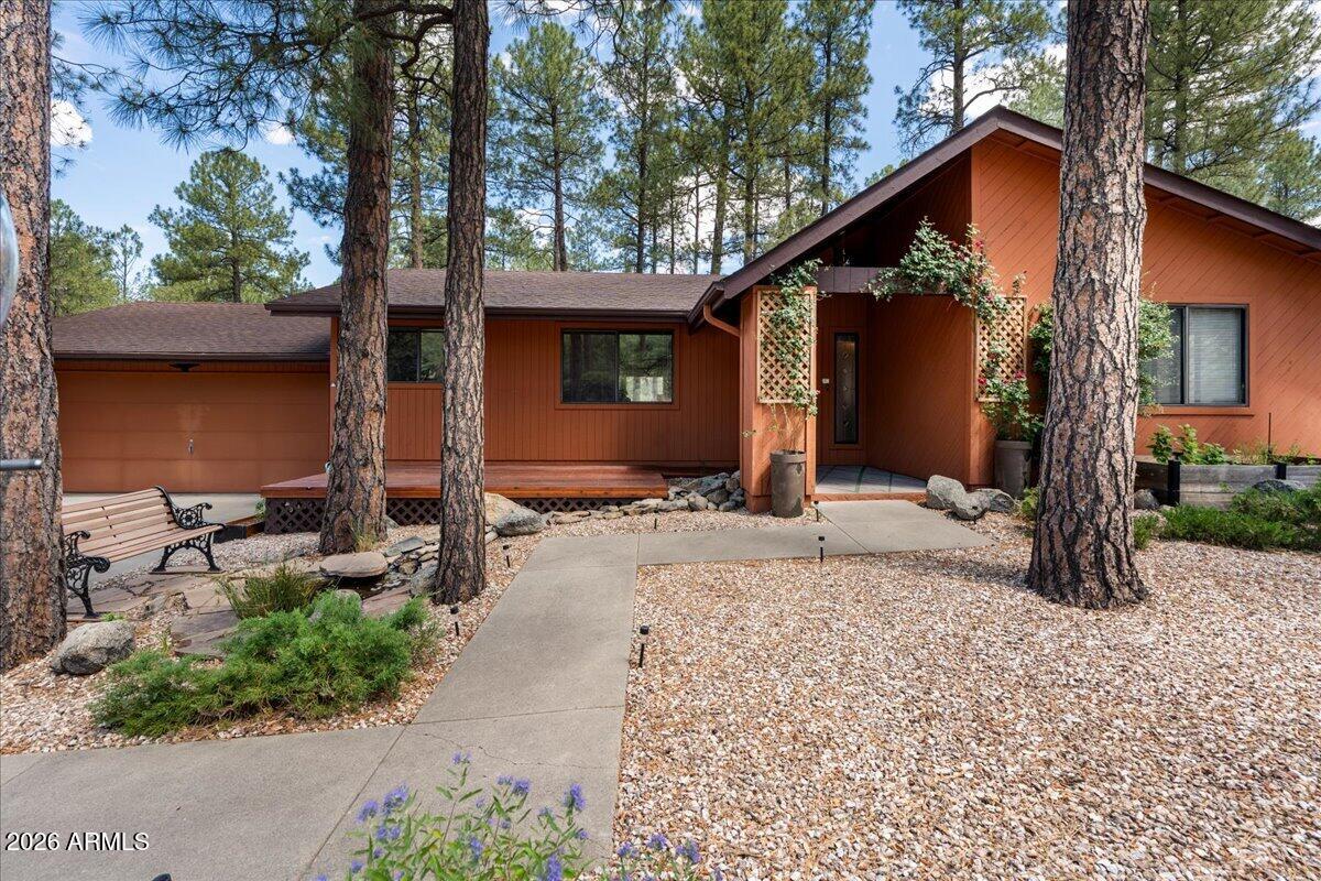WELCOME TO THE SERENE SETTING OF HIDDEN VALLEY DRIVE. THIS HOME IS NESTELED IN THE HIGHLY DESIRABLE SUBDIVISION OF HIDDEN VALLEY RANCH. JUST MINUTES FROM DOWNTOWN PRESCOTT BUT SO CLOSE TO THE FOREST FUN. HIDDEN VALLEY RANCH IS THE PERFECT BLEND OF BOTH. SINGLE LEVEL LIVING WITH LARGE LIVING AREAS AND PINE TREE VIEWS OUT OF EVERY WINDOW. COZY ELECTRIC FIREPLACE WARMS THE CHILL OF A COOL PRESCOTT EVENING. COME SIT ON THE FRONT DECK
AND ENJOY THE SOUNDS OF THE KOI POND OR ENJOY THE BACK PATIO WITH YOUR OWN SALTWATER SPA. PLENTY OF ROOM HERE FOR ENTERTAINING. COME AND SEE IF HIDDEN VALLEY DRIVE IS A GOOD FIT FOR YOUR NEXT PRESCOTT HOME.