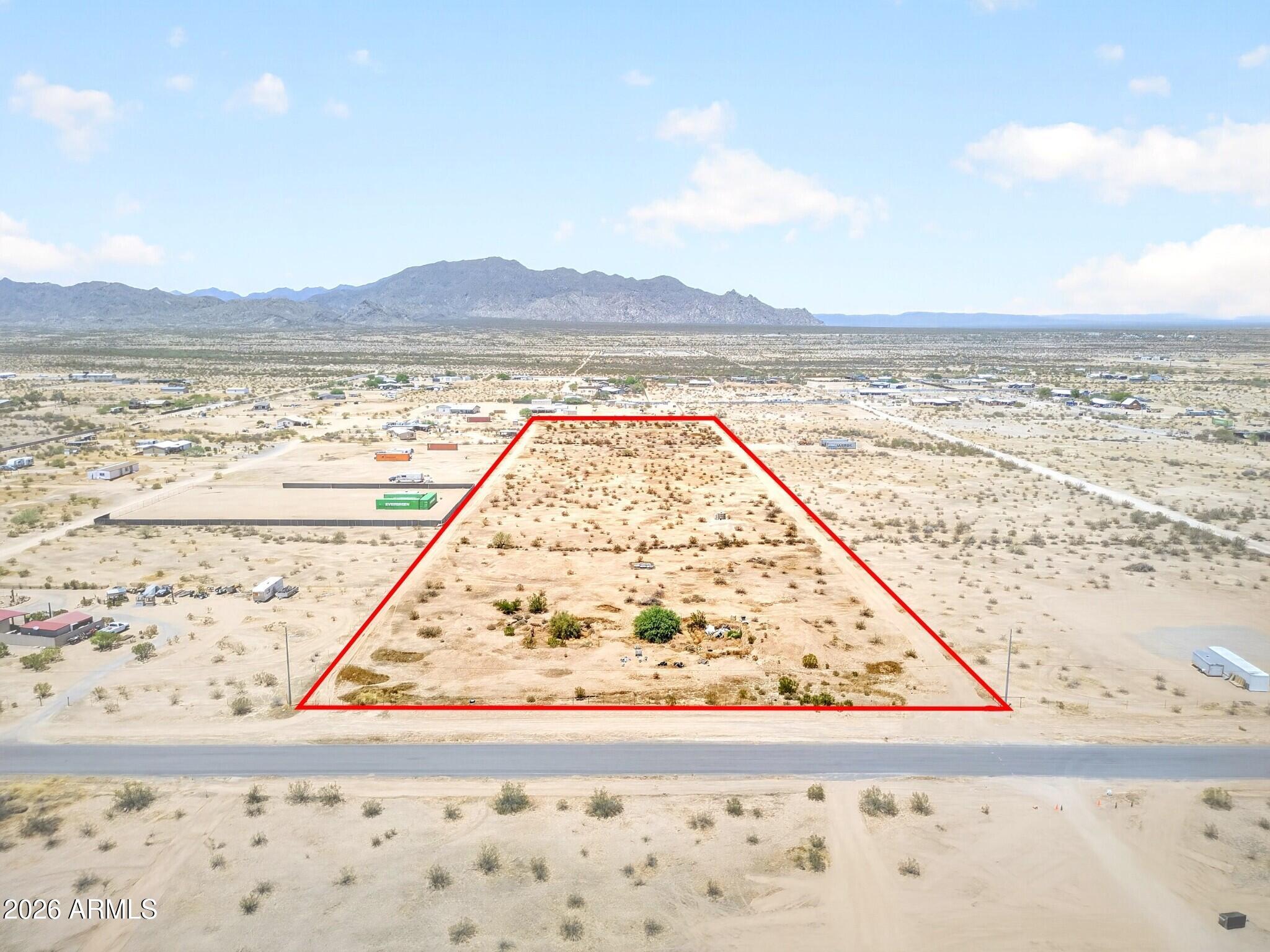 An exceptional opportunity to own one of the most versatile land holdings in Maricopa's adventure corridor. This unique property features an impressive 800-foot private well producing 20+ GPM, providing ample water capacity to support all four existing parcels with potential to subdivide into as many as seven lots, buyer to verify. Whether you're a builder, developer, investor, or seeking a private estate with room to expand, this property offers tremendous upside and flexibility. The land combines wide-open desert views, privacy, and easy access to the area's recreation and attractions, with Skydive Phoenix nearby and Palo Verde Regional Park right next door. Buyer to verify zoning, utilities, access, subdivision requirements, and intended use.