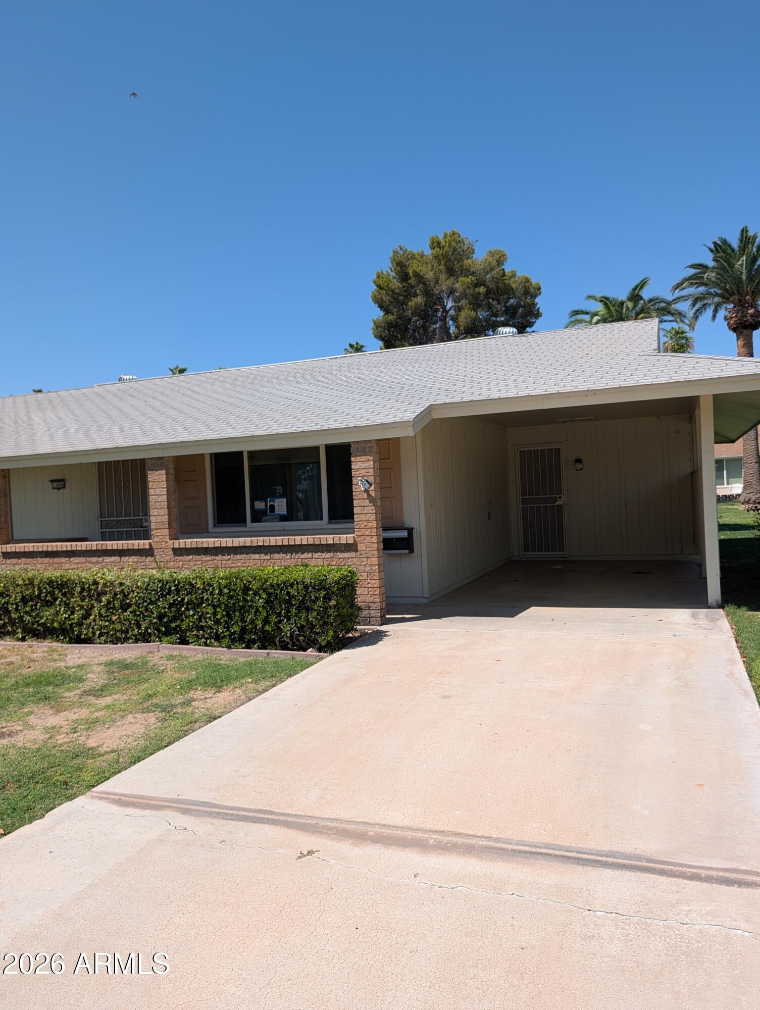 Enjoy the all of the amenities of the active Sun City lifestyle. Whether you enjoy swimming, pickleball, tennis, spa, fitness center, or one of many clubs and/or social events, Sun City may have an activity for you. Or if you prefer solitude, you can easily find that too. This lovely 2 bedroom and 1 bath Gemini Home, gives you space, all the while having no wasted space. The kitchen features granite counter tops, and bright appliances. A pantry, and laundry room right off the kitchen is a stones throw away from any part of the home. There is a combination of tile & carpet flooring. Out in the back you have a expansive greenbelt and fruit trees, giving off a soft manicured backyard area to relax, enjoying early mornings, early evenings, or anytime in between. This 55+ community awaits.