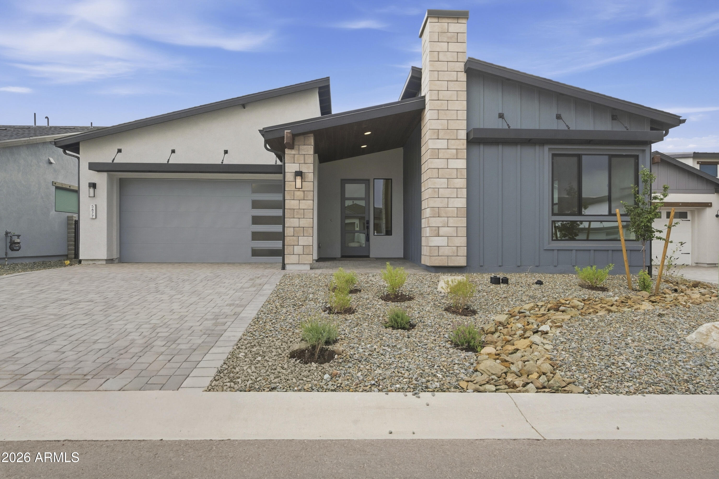 This beautifully designed home is ready for you to move right in! Featuring 2693 sq ft, 4 bedrooms, 3.5 bathrooms, and 3 car tandem garage. Including a fireplace, side yard access, upgraded wood look tile flooring in the living area and primary bedroom, light fixtures, and we added the refrigerator for even more value.