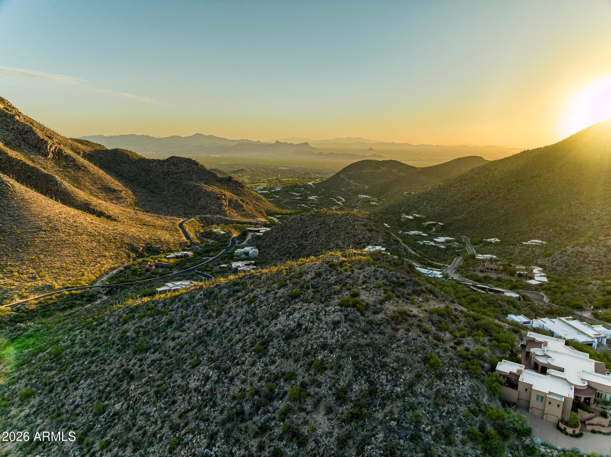 Welcome to Cush Canyon Crown -- an extraordinary homesite offering sweeping panoramic views and the perfect setting to bring your dream home to life. Tucked within the gated community of
Canyon Pass at Dove Mountain, this remarkable property combines serenity, privacy, and awe-inspiring natural beauty. Design a residence that seamlessly blends with its surroundings. This is a rare
opportunity to own a piece of paradise and create a truly custom retreat in Canyon Pass. Experience a lifestyle defined by elegance, comfort, and the grandeur of the desert landscape.