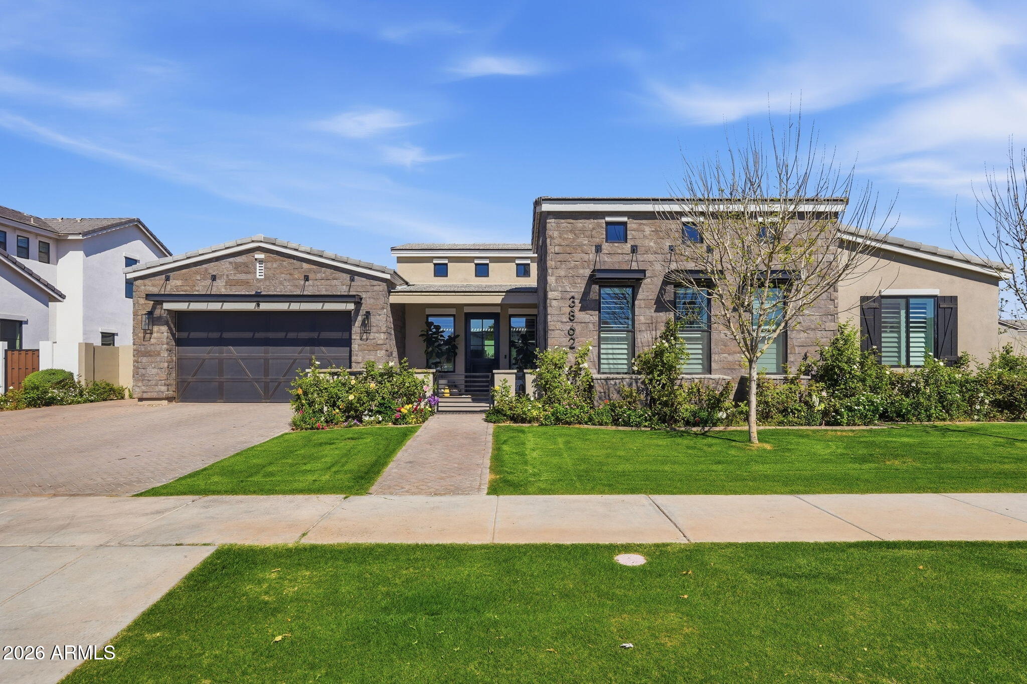 Welcome to a modern yet timeless luxury residence in Morrison Ranch where thoughtful design meets exceptional craftsmanship. 
A dramatic paneramic wall of sliding glass doors creates a seamless indoor-outdoor connection, flooding the home with natural light! At the heart of the home, a stunning atrium enhances the open ambiance and architectural character. 
The gourmet kitchen is designed for entertaining, featuring custom cabinetry, quartz countertops, and premium Wolf and Sub-Zero appliances.
The expansive primary suite serves as a private sanctuary, complete with a soaking tub, dual glass-enclosed showers, and spa-inspired finishes. 
Outdoors, a resort-style backyard awaits a private oasis offering countless luxury features designed for relaxation and unforgettable gatherings!