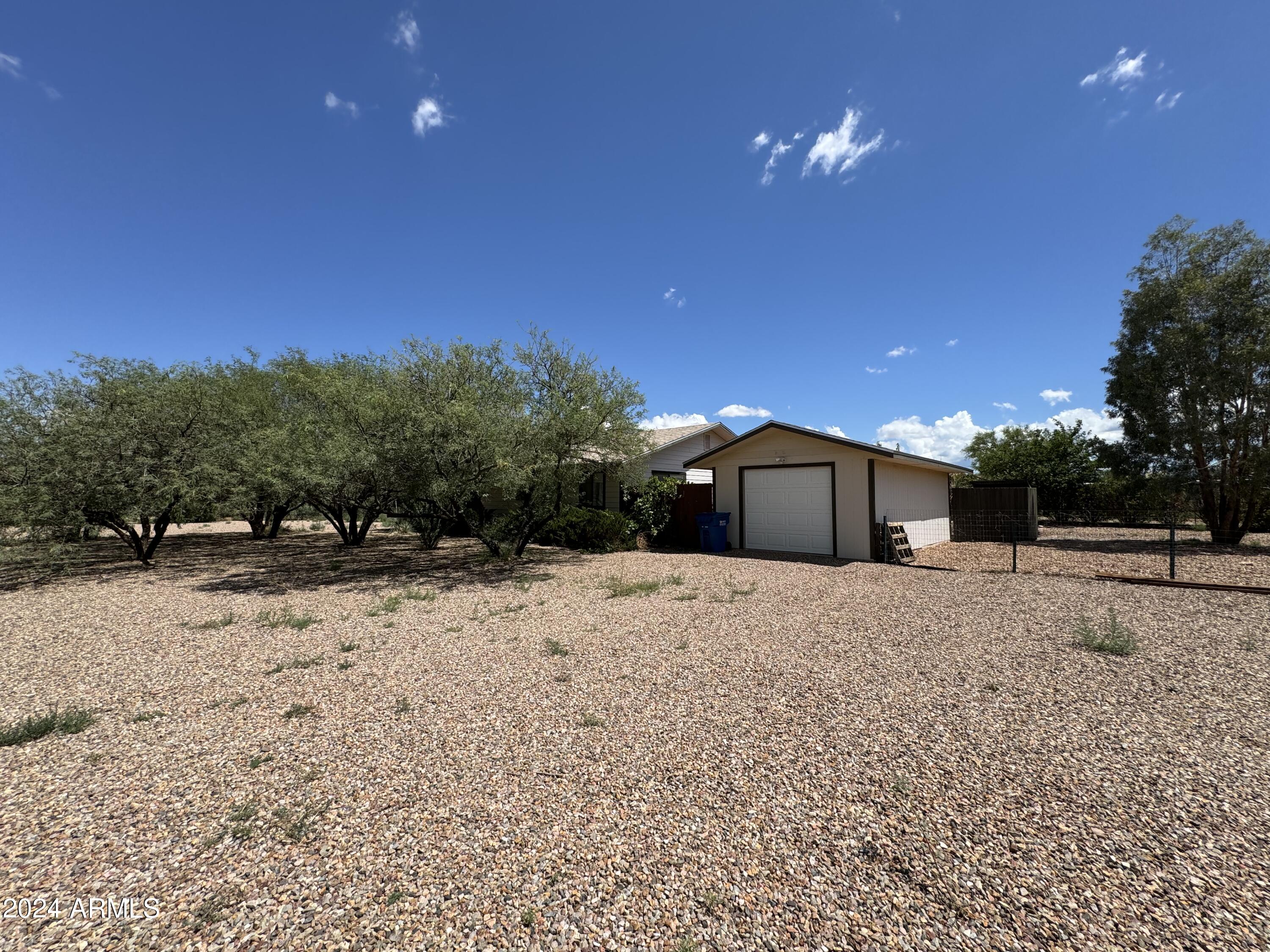 This beautiful 3 Bedroom, 2 Bath home with a garage in Huachuca City, AZ is minutes from Ft. Huachuca and shopping. Great location, dual pane windows, ceiling fans & all vinyl flooring! The kitchen features an open floor plan. The property is also on half an acre and fully fenced.