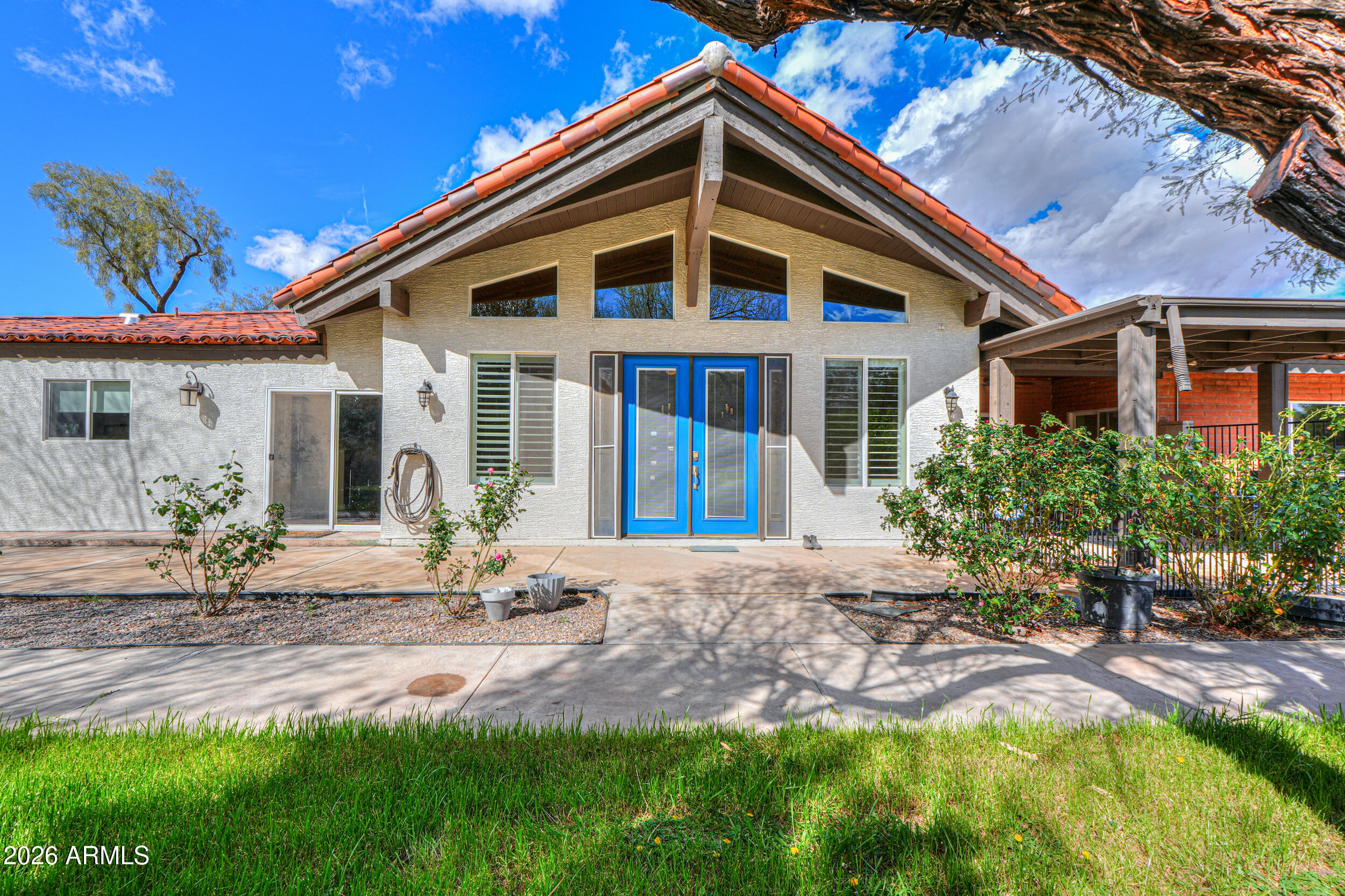 Create your own desert estate on nearly 5 acres in the heart of Casa Grande - now positioned with customization in mind.  This exceptional ranch-style property offers a rare combination of an updated, move-in ready interior and a blank canvas outdoors ready for your vision.  Inside features vaulted ceilings, travertine and wood flooring, a chef's kitchen with granite counters, island, breakfast bar, and gas range. The primary suite is highlighed with a cozy beehive fireplace and walk-in shower, while a secondary bedroom includes its own ensuite setup. Enjoy a private pool with waterfall, solar heat, and outdoor shower, plus a 3-car garage with workshop. Owned solar and private well for gardening support efficiency. Endless potential- build your ideal setup for RVs, shop space, and horses!