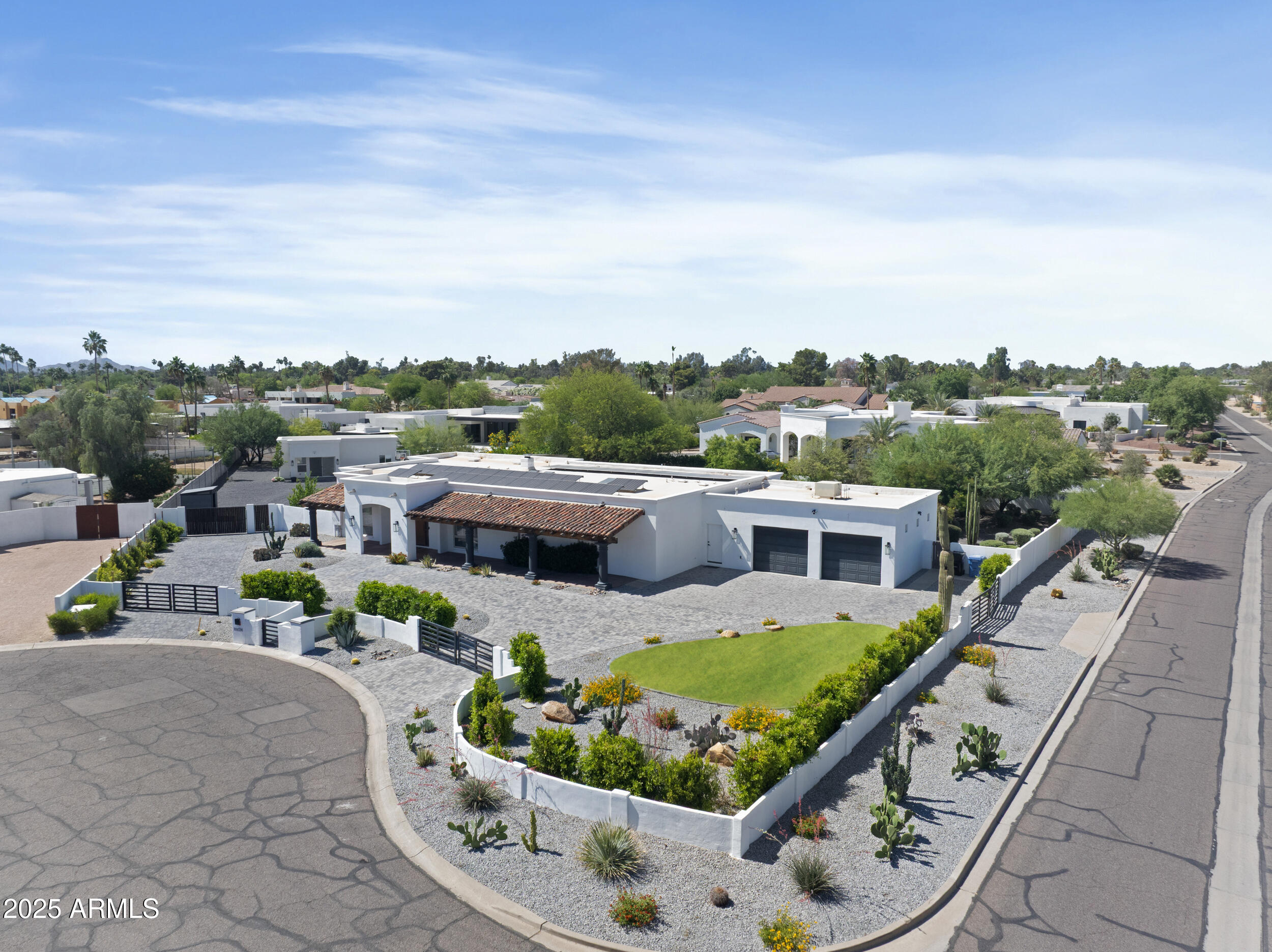 This thoughtfully designed residence offers the perfect balance of luxury, functionality, and family-friendly living. Set on nearly an acre and zoned for the top-rated SUSD ''C'' schools, the main home features a spacious primary suite, a versatile two-room junior suite ideal for older children or guests, and three additional bedrooms. The open-concept kitchen and great room create a welcoming space that flows seamlessly into the expansive backyard, complete with a sparkling pool and multiple entertaining areas. A detached two-room guest house and separate office structure provide excellent flexibility for extended family, visitors, or remote work. Additional highlights include a large laundry room, garage with evaporative cooler, and owned solar. Make this home yours today!