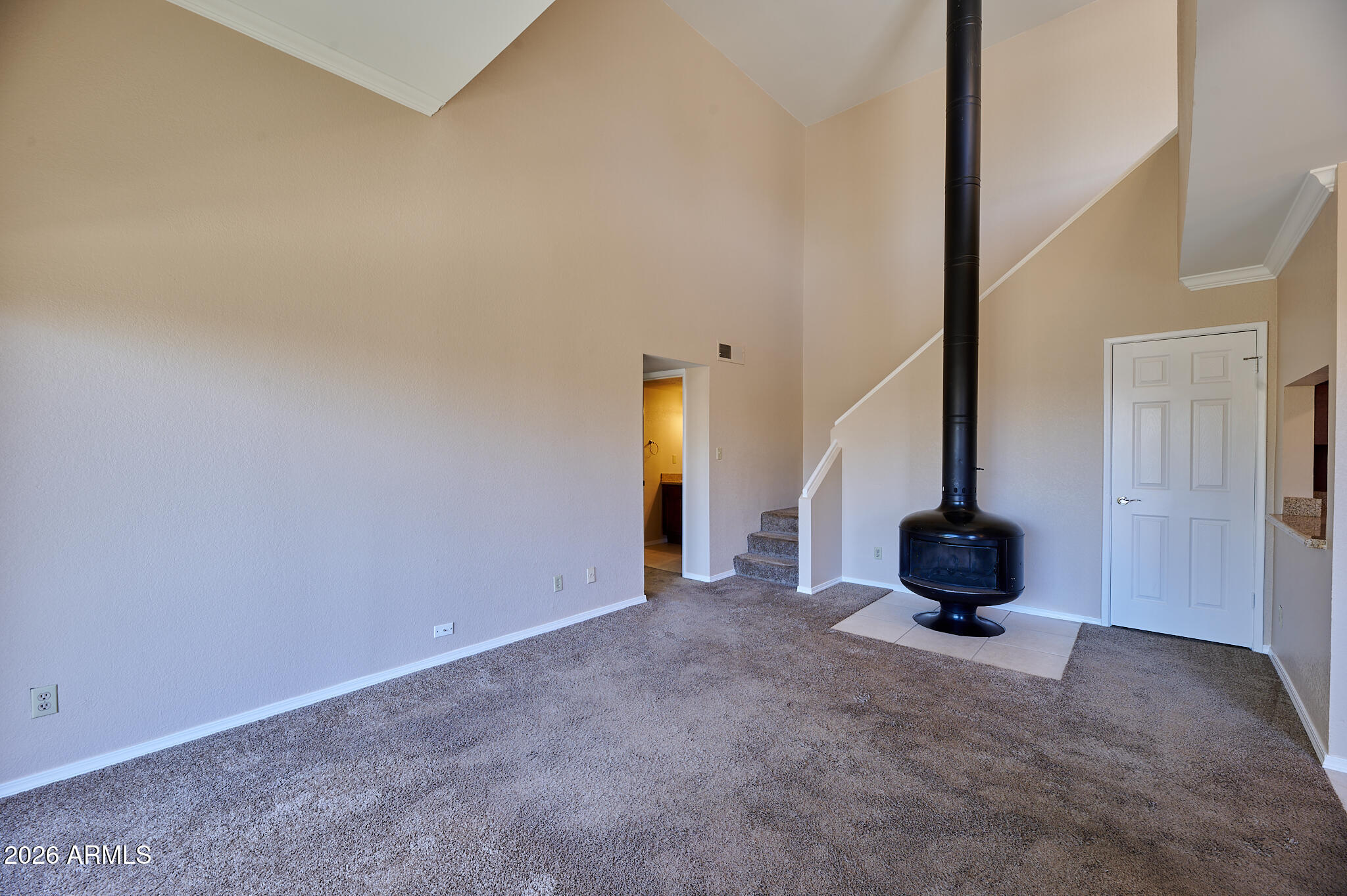 Highly desirable condo in Sunrise Condos, ideally located in prime Old Town Scottsdale. This 1 bed plus upstairs loft, 1 bath home offers 962 sq ft of open-concept living with granite countertops, fireplace, and in-unit stacked washer/dryer. Light and bright, move-in ready, and ideal for full-time living, lock-and-leave, or investment. Community features include 2 heated pools and spas, fitness center, and lush grounds. Situated next to the Continental Golf Course and adjacent to a multi-use trail. Minutes from Old Town shopping, dining, nightlife, golf, and spring training. Easy access to Loop 101, Scottsdale, and Tempe.