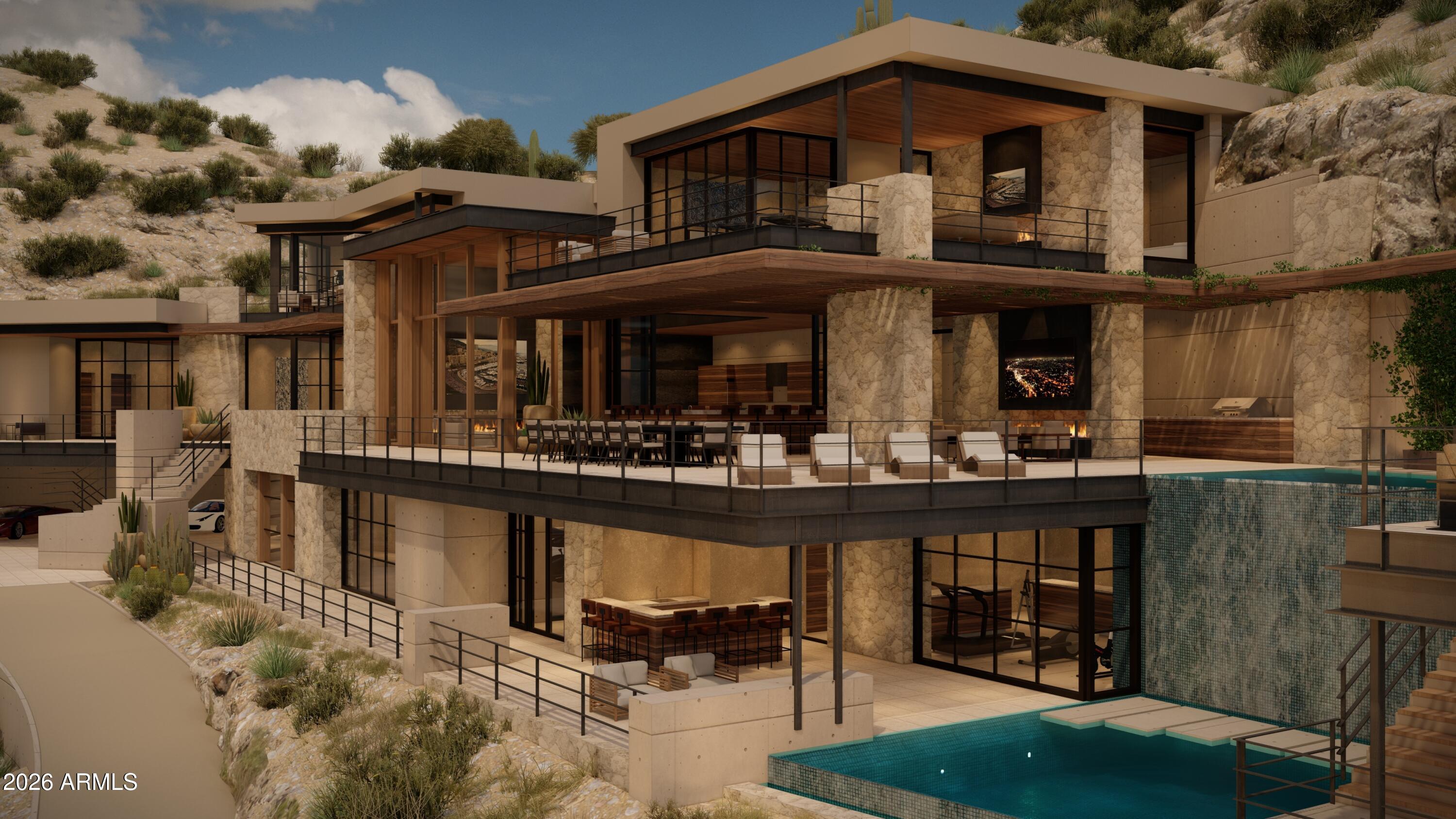Set atop more than 6 acres of breathtaking terrain, this exceptional 288,130 sq ft parcel offers a once-in-a-generation opportunity to craft a true Paradise Valley masterpiece. A gated entrance sets the tone as you enter this extraordinary Mummy Mountain estate site. With no HOA, on-site utilities already at the curb—water, power, cable, phone, and gas—and the rare advantage of a more relaxed hillside ordinance, this lot is significantly more buildable than typical mountainside offerings.  This is a canvas worthy of architectural ambition-hillside committee approved plans available from renowned architect Drewett Works. Plans boast 10,000sf home, 5 car garage, a gym with cold plunge and 4 bedrooms plus an office! A chance to create something truly extraordinary. A sanctuary for an iconic home. Your Mummy Mountain legacy begins here!