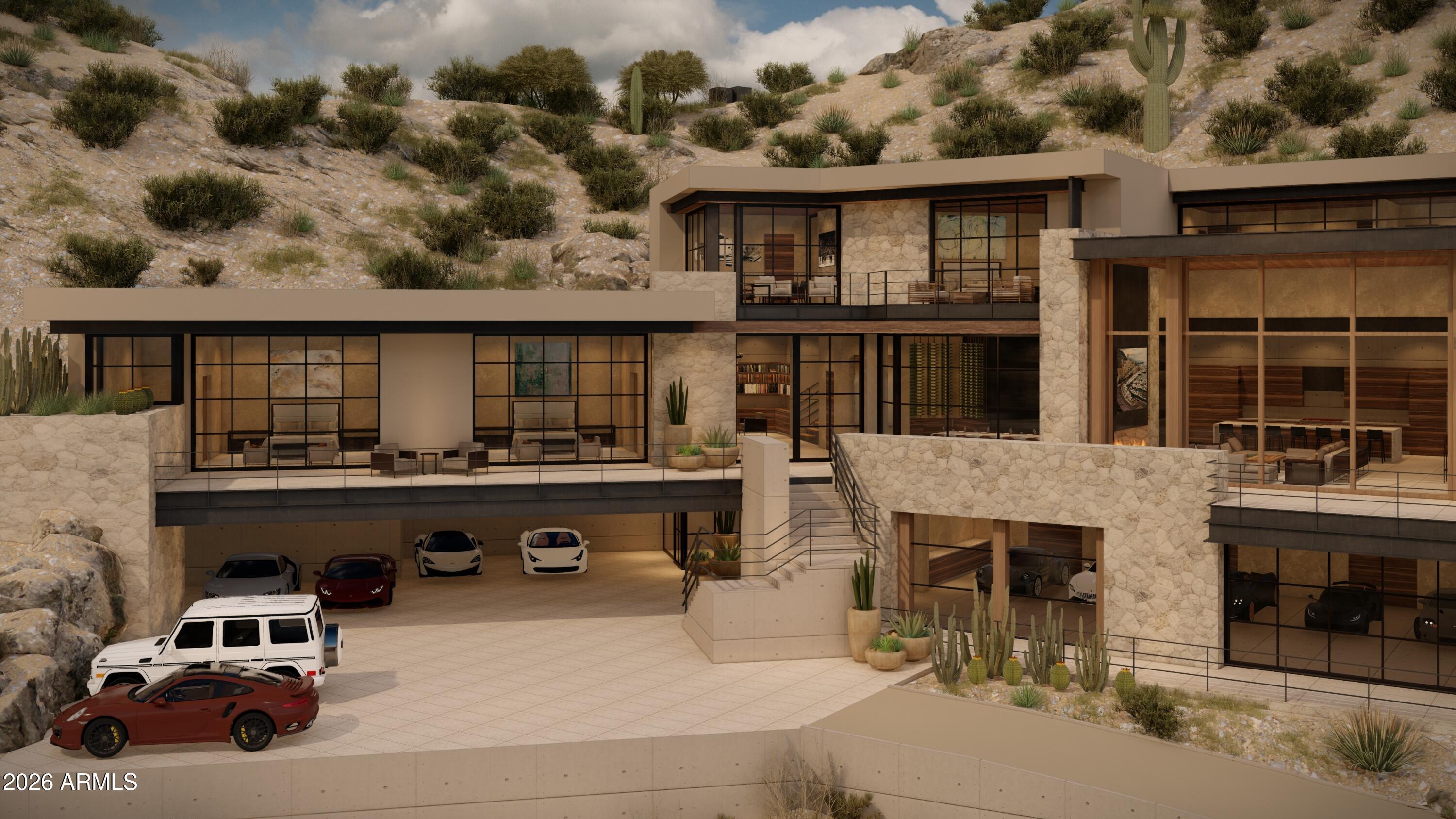 Set atop more than 6 acres of breathtaking terrain, this exceptional 288,130 sq ft parcel offers a once-in-a-generation opportunity to craft a true Paradise Valley masterpiece. A gated entrance sets the tone as you enter this extraordinary Mummy Mountain estate site. With no HOA, on-site utilities already at the curb—water, power, cable, phone, and gas—and the rare advantage of a more relaxed hillside ordinance, this lot is significantly more buildable than typical mountainside offerings.  This is a canvas worthy of architectural ambition-hillside committee approved plans available from renowned architect Drewett Works. Plans boast 10,000sf home, 5 car garage, a gym with cold plunge and 4 bedrooms plus an office! A chance to create something truly extraordinary. A sanctuary for an iconic home. Your Mummy Mountain legacy begins here!