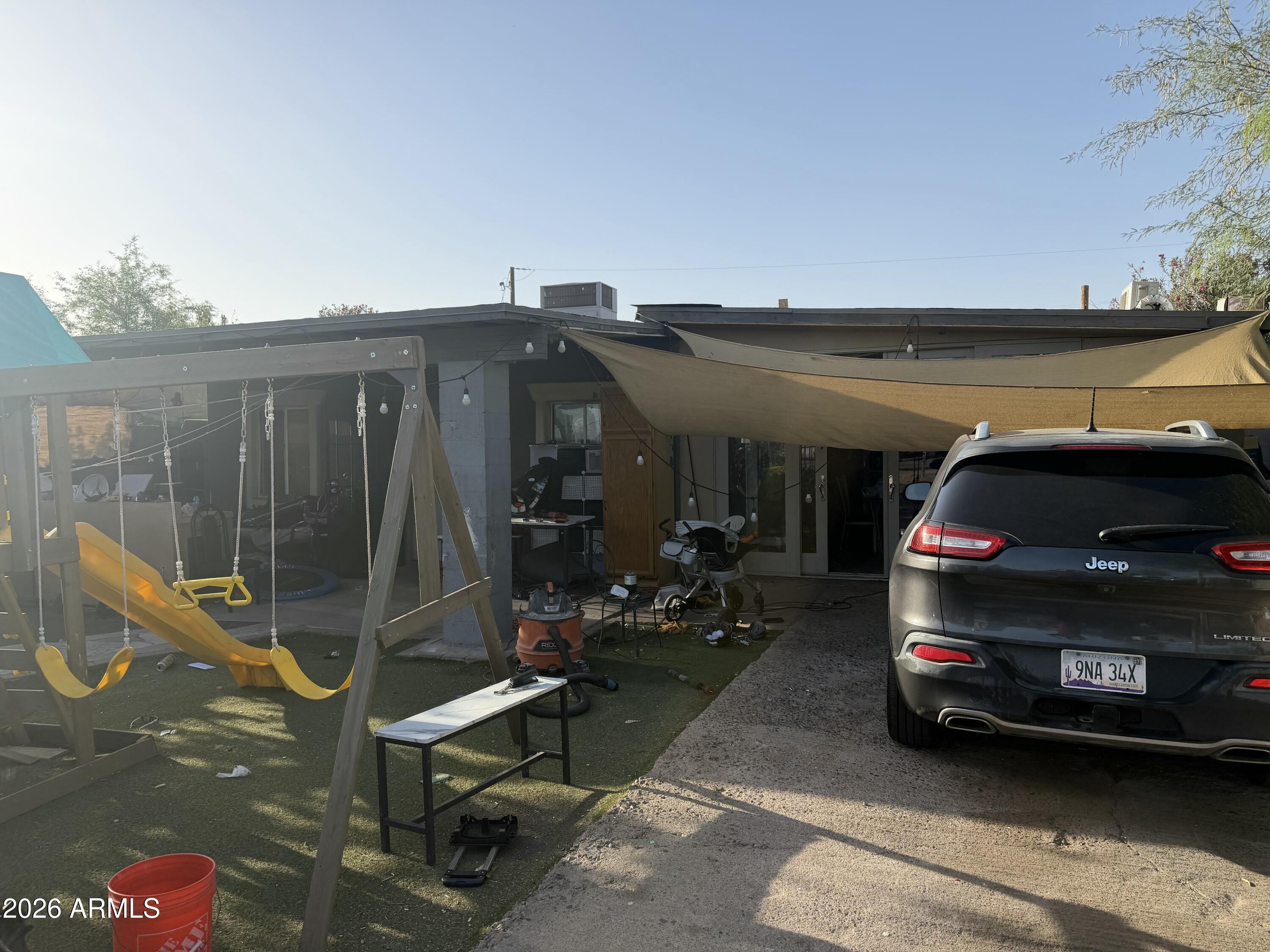 Great opportunity for an investor or buyer looking to add their personal touch! This livable home features a renovated kitchen but needs TLC and updating throughout. 
The property includes a livable RV with two wall A/C units and a detached bonus room with its own bathroom and wall A/C, ideal for a home office, guest space, or possible extra income. RV gate access available through the alley. Mature plants add charm to the front yard.
Plenty of potential and flexible use options for the right buyer! House sold as is no repairs.