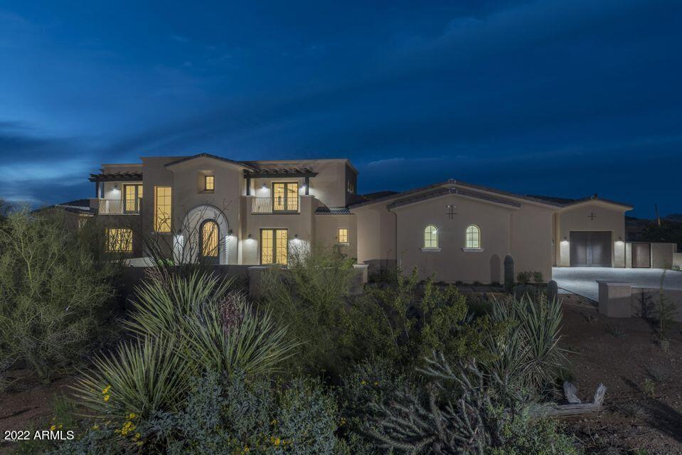 Completed March 2017, Exquisite new custom home located in secure gated Pinnacle Canyon at Troon North, with dramatic mountain views of Pinnacle Peak. Includes imported hand carved limestone fireplaces, automated sliding pocket doors, solid cedar wood beam ceilings, Vintage French Oak wood plank floors, Italian marble in baths, imported hand-carved Mexican Cantera stone columns, sills, & fountain, alder cabinets, poplar wood interior doors. Italian marble counter tops in master & laundry, Quartz kitchen counter tops with marble tops at large islands, Subzero & Wolf appliances. Includes heated pool & spa, BBQ w/sink, fire pit & putting green. Guest Casita boasts it's own garage, kitchenette and private entrance. Close to fine dining, shopping, golf, tennis, hiking & biking trails, resorts