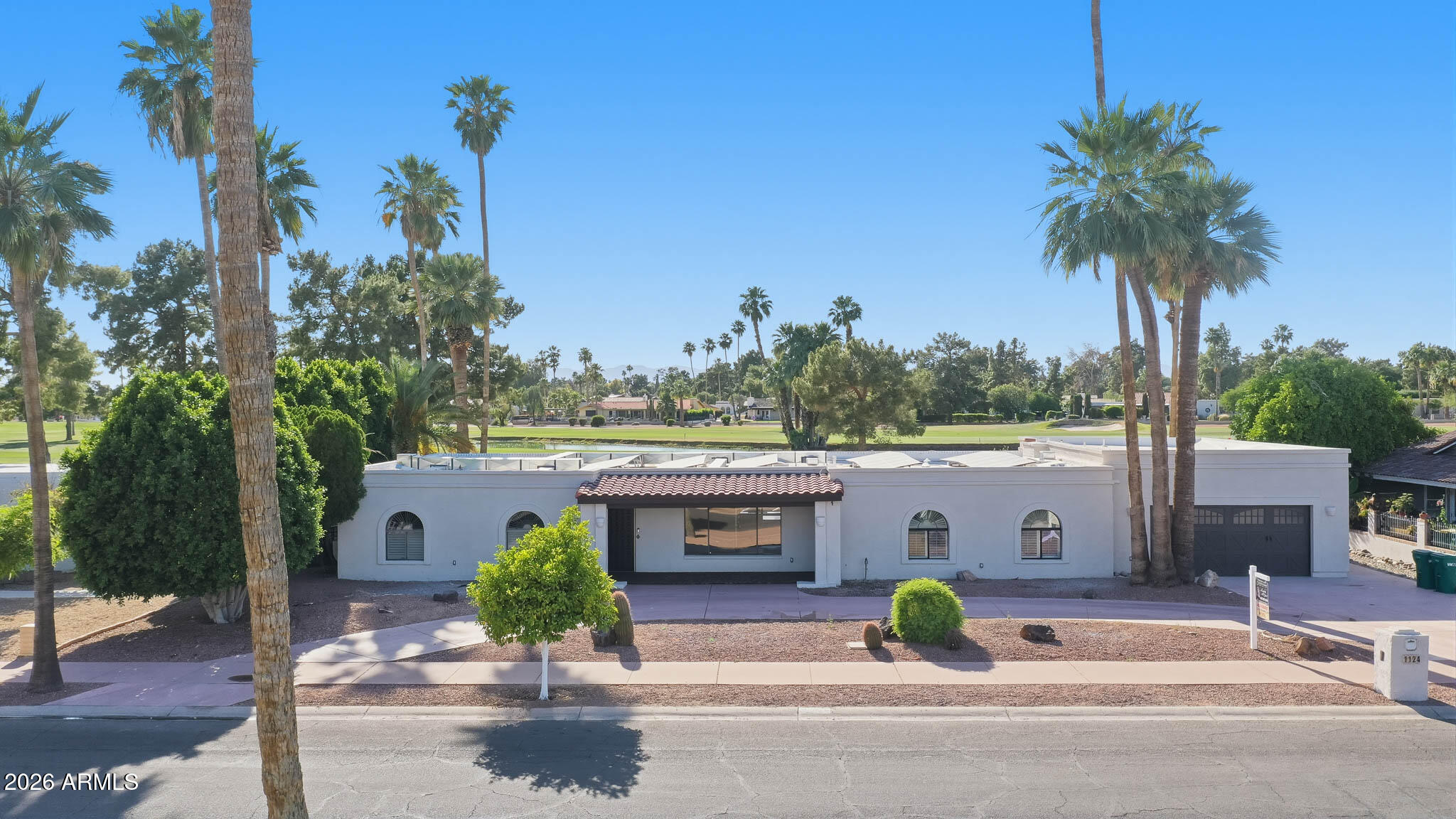 LOCATION! Golf Course - Solar Owned home located on the 14th hole of the Wigwam Gold Golf Course!
Welcome to refined luxury living in this fully remodeled 5-bedroom, 4-bathroom golf course home in the highly sought-after ''The Park'' location, in desirable Litchfield Park. This luxurious residence offers a perfect blend of comfort, elegance, and modern updates, making it an ideal home to make your own.
Step inside & be greeted by the open & bright floor plan, featuring a brand-new kitchen complete with beautiful cabinetry, sleek countertops, state-of-the-art appliances, & a large walk-in pantry for exceptional storage and organization. 
Just off the main living areas, you'll find a laundry/mudroom, offering added functionality & convenience for everyday living. The spacious living areas are adorned with a cozy fireplace, creating a warm and inviting atmosphere. Large windows provide abundant natural light & breathtaking views of the golf course, enhancing the home's overall appeal.
The thoughtfully designed layout includes five generously sized bedrooms, three of which feature private en suite bathrooms and walk-in closets, providing comfort, privacy, & ample storage--perfect for family members or guests.
Enjoy the attached casita, perfect for guests or a private office, which includes a bathroom that opens directly to the pool area, as well as, a private entry for added convenience. (Walk through the garage to access the casita).
Take a dip in the sparkling waters while overlooking the picturesque golf course, or relax by one of the two fireplaces--one indoor & one outdoor.
The outdoor living space is complete with a grilling area, shaded patio & artificial turf, making it perfect for entertaining. This home also boasts built-in garage cabinets, a circular driveway for easy access, & solar panels to help reduce energy costs.
Located on the 14th hole of the prestigious Wigwam Gold Golf Course, this property offers a unique & desirable lifestyle in a renowned neighborhood. Don't miss the opportunity to own this exceptional property with all the modern amenities & stunning views. Come visit today and experience the ultimate in luxury living.