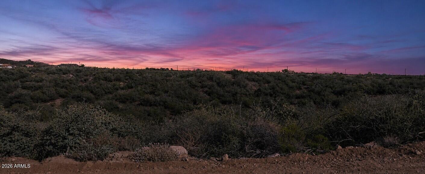1.89 acres ready for your dream home—site-built or manufactured! And yes the seller is open to carry with the right terms, and up to 10 years! Don't miss out if you have been thinking about buying property, not many sellers are open to carry the note up to 10 years. No HOA and a water co-op that delivers right to your property with no delivery fee—you only pay for the water itself. Electricity is nearby for easy connection. Just a few parcels from Prescott National Forest, offering endless outdoor recreation. Enjoy peaceful rural living while staying conveniently close to town—only 17.8 miles to Prescott, 83 miles to Sedona, 113 miles to Flagstaff, and 111 miles to Phoenix. Escape the hustle of the city yet remain within easy reach of all amenities.
