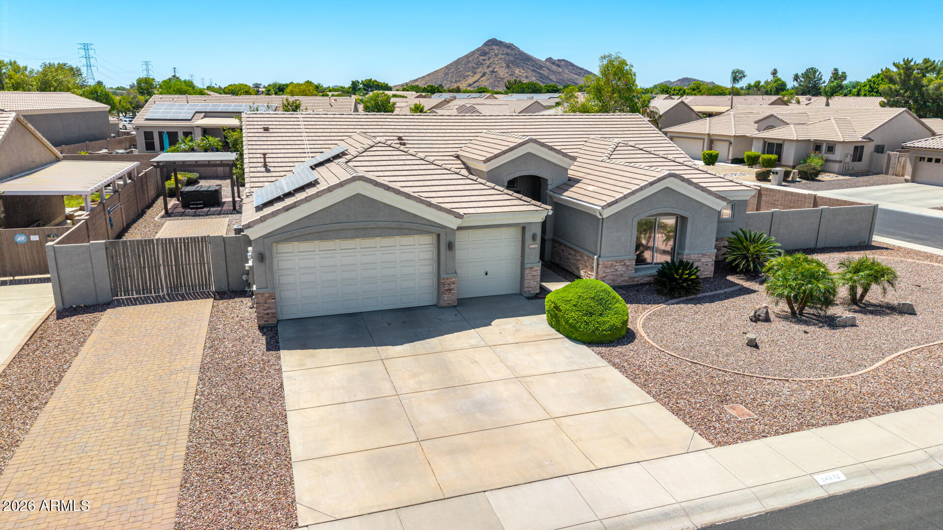 Welcome to this spacious, beautifully renovated north Glendale home in the highly sought-after Stetson Court neighborhood! Perfectly positioned on an expansive .31-acre corner lot on a cul-de-sac street, this impressive home offers over 2,590 square feet of thoughtfully designed living space with 4 bedrooms, 2.5 bathrooms and an ideal layout for both everyday living and entertaining. A custom iron and glass front door creates a stunning first impression, while elegant tile flooring, soaring ceilings and abundant natural light enhance the home's warm and inviting atmosphere. The inviting split floor plan features a formal living and dining room, along with a comfortable family room that opens to the kitchen, creating the perfect gathering space. The well-appointed kitchen boasts abundant cabinetry, granite countertops, sleek appliances, a large center island with breakfast bar, a pantry and a sunny dining nook. The bright and spacious primary suite provides a luxurious retreat, complete with a beautifully updated en-suite bathroom featuring a custom tiled shower with seamless glass enclosure, dual vanity with granite countertops, and refined designer finishes. Step outside to your own private backyard oasis, complete with a sparkling pool with water feature, above ground spa, two pergolas and a spacious covered patio with retractable awning, perfect for relaxing or entertaining family and friends year-round. Owned solar adds exceptional value and energy efficiency. Located just around the corner from the community park and only minutes from shopping, dining, schools, golf, recreation areas, hiking trails, freeway access and more, this exceptional home combines luxury, comfort, convenience and an outstanding location. This is a rare opportunity to own a home that truly has it all - truly AZ living at it's finest!