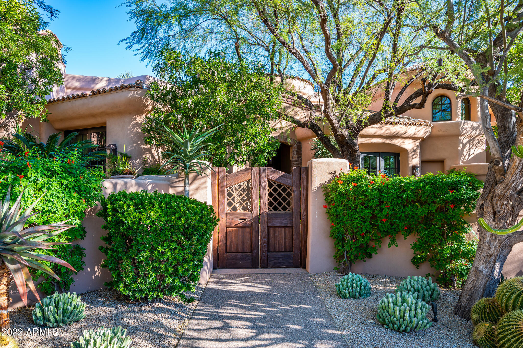 Charming Santa Barbara/Mediterranean style home designed by Lash McDaniel. The home is located on 2 1/2 lots and has fabulous views of mountains and The Cochise Golf Course. Lush landscaping, and the ultimate in outdoor entertaining. The interior is straight out of ''Phoenix Home & Garden'' magazine, with every detail in design. Split floor plan allows privacy for the owner and guests. 3 bedrooms on the main floor, with the office/4th bedroom upstairs. Truly, a Desert Mountain Classic home. 
A Golf membership available to be purchased with this property. A 30-day Membership application review and approval is required. Contact the Club prior to writing a property purchase contract.