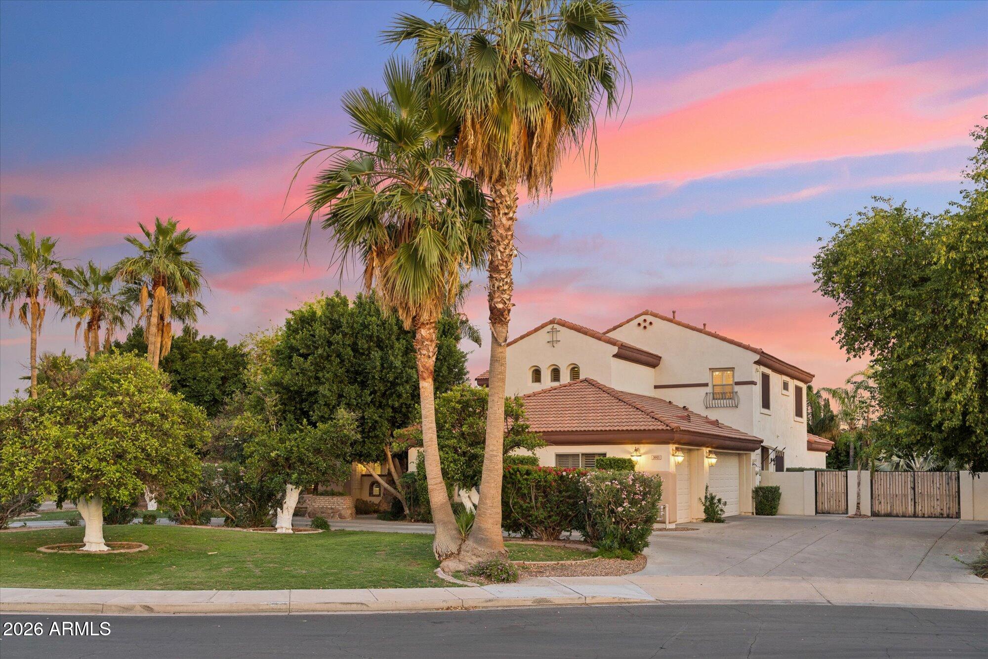 Located on a quiet cul de sac across from the park, this enchanting home is set on over half an acre and features a 3-car side-entry garage with EV charging, RV gate and parking, and generous additional space for vehicles and recreational storage. The kitchen features new quartz countertops, walk-in pantry, oversized eat-in kitchen with coffee bar and built in desk, stainless steel appliances, double wall ovens, two new dishwashers, and a new smart stove. The primary suite offers a private and spacious layout with a sitting area, fireplace, and plantation shutters. The backyard is designed for outdoor living, with a covered patio, fireplace, built-in BBQ, and a fenced pool and spa. Two storage sheds and a bonus room in garage.