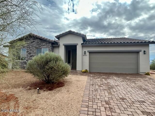 Lovely home with views of surrounding Mountains. WATER IS SECURED & Registered with EPCOR's New Facility. The backyard amenities: extended back patio pavers, Spa, Built-in Pizza Oven & Patio heaters, Pergola w/outdoor table, benches, tabletop heaters and lighting. Fully Fenced with gates at entrance & side yard.  Propane Tank (owned) which is stubbed for BBQ & Patio Heaters. RV Cover w/decking and an oversized storage shed & covered area surround. 50 AMP RV power at shed. Irrigation to planted trees. Exterior painted 2023. Unique double sided fireplace between the Greatroom & Master. Kitchen has a GAS range, S/S Appl, Backsplash w/Granite Counters. Tile Floors & 8' Doors. Fully Tiled Shower/Tub Baths. Ceiling Fans & Custom window coverings. Truly a delightful home and very well cared for.