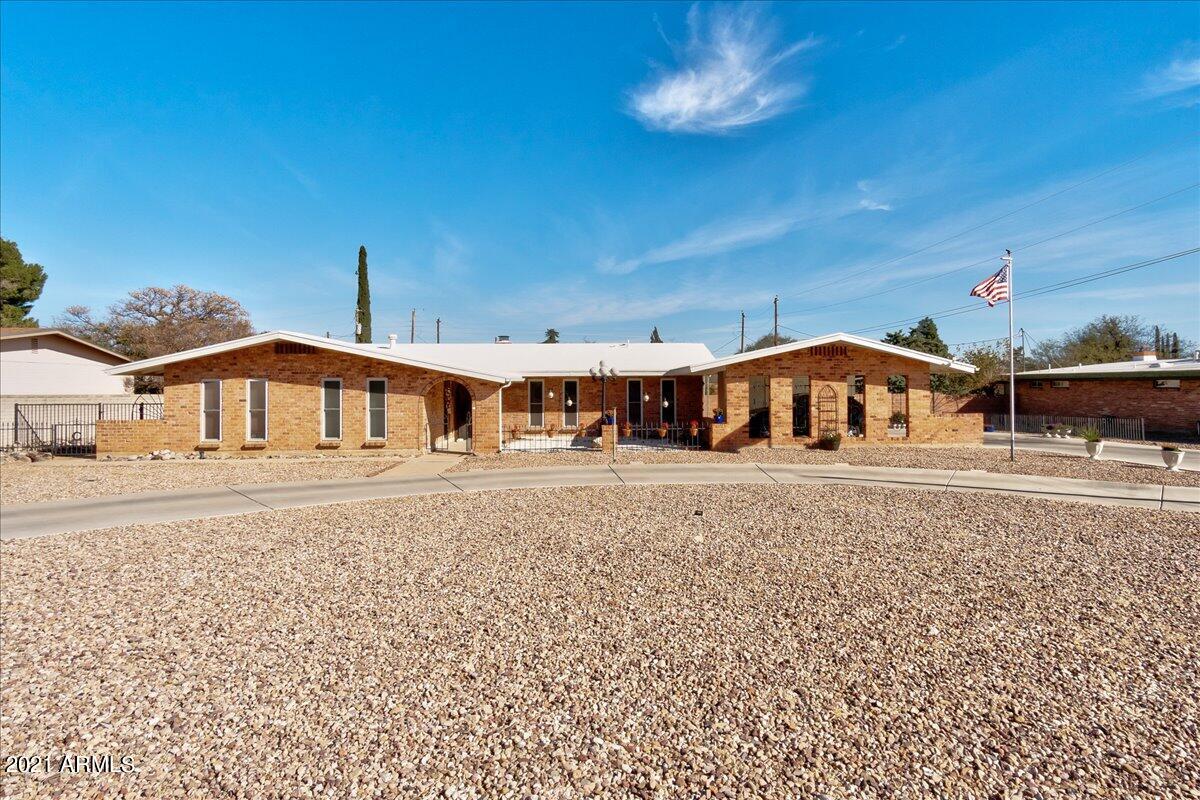 Look no further! Welcome home to this beautifully updated and lovingly cared for home.  There is space galore, four over sized bedrooms, formal dining room,  gorgeous eat in kitchen/den combo, fully finished Arizona Room, bonus sitting room/office and a fully finished shed in the back perfect for a theatre or home office.  Too many finishing touches to list here.  All of this on a large half acre lot in a well established neighborhood.  Don't miss out!
