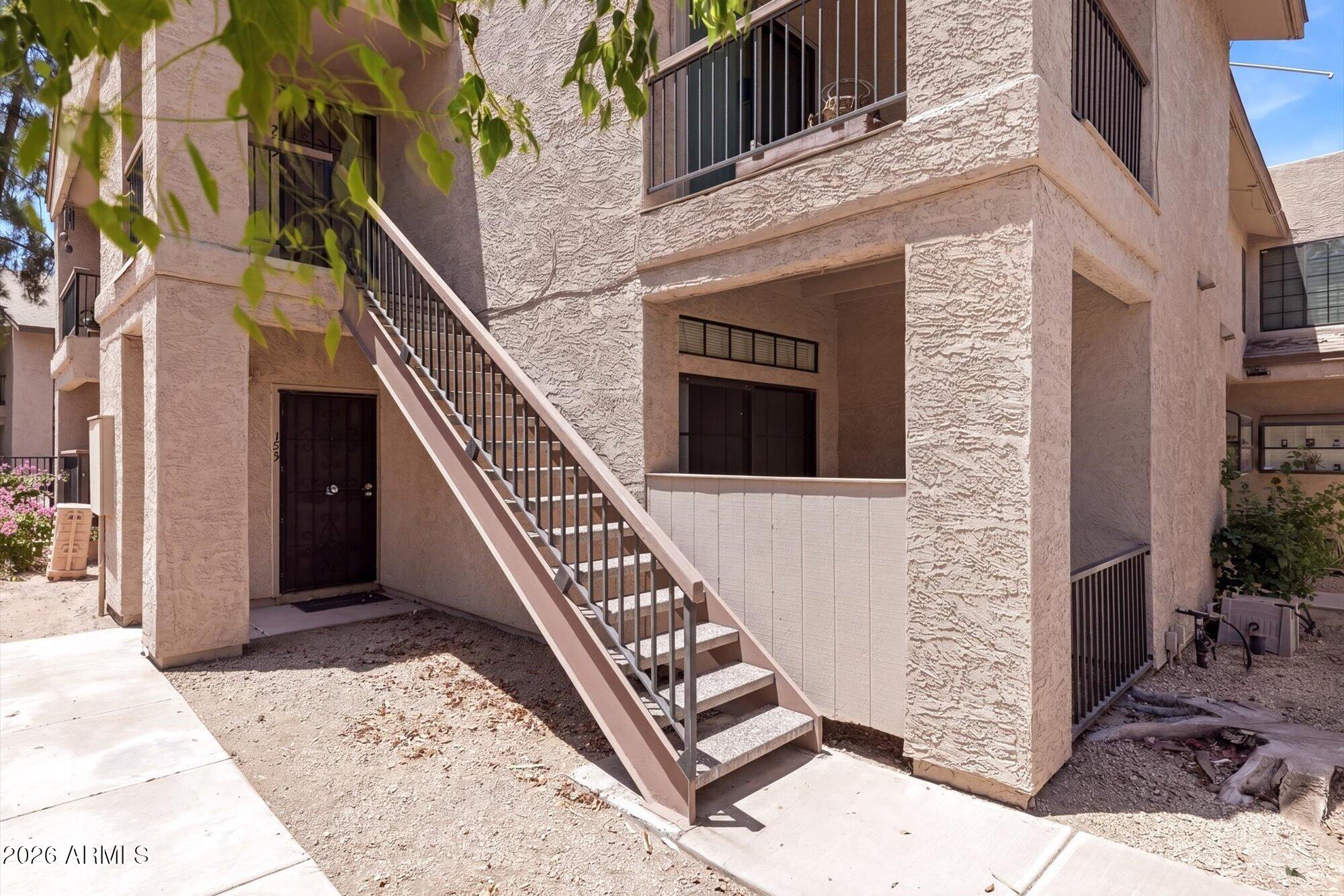 Private end unit with coveted 1-car garage and two patios,one off the primary bedroom and a larger patio off the living area overlooking the sparkling pond. Spacious floorplan with cozy fireplace, separate dining area, and breakfast bar. The bedroom features a huge walk-in closet plus a second closet for additional storage. In-unit laundry with washer/dryer and a separate storage closet located off the back patio. The entire condo has been freshly painted and features a new hot water heater.