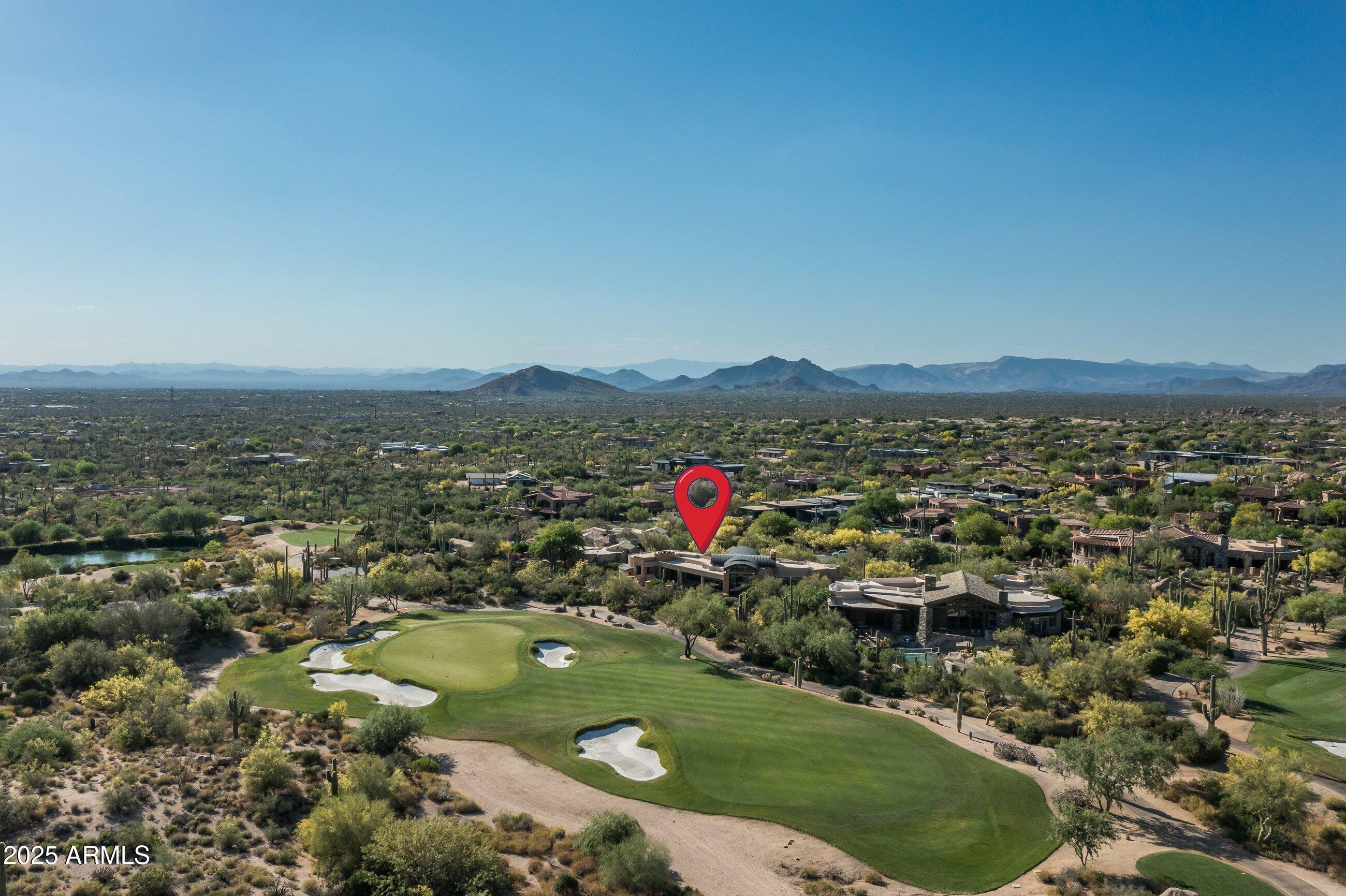 | ESTANCIA GOLF MEMBERSHIP AVAILABLE |  Contemporary architecture sited on the 3rd hole of The Estancia Club with south-facing golf course, Pinnacle Peak and sunset views.  The timeless contemporary design includes a large primary suite, two guest suites and a large office or 4th guest suite.  The oversized great room has a stacked-stone gas fireplace, soaring ceilings with tongue & groove detail and floor-to-ceiling windows framed on Pinnacle Peak. The chef's kitchen includes shaker-style cabinetry, Wolf, SubZero and Bosch appliances complete with a walk-in pantry.  The outdoor living area offers a covered dining/living area, gas fireplace, heated pool/spa, built-in BBQ station and panoramic golf course, sunset and mountain views. The private cul-de-sac lot completes the residence.