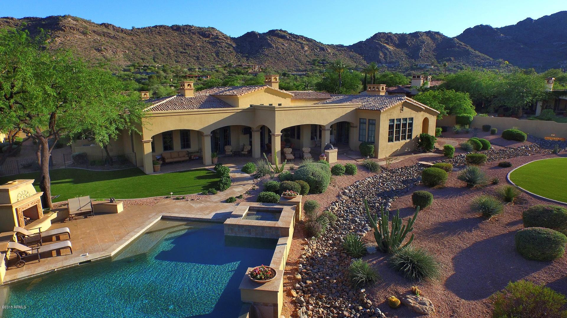 TRANQUIL CITY LIGHTS,SWEEPING MOUNTAIN VIEWS,SUNRISES,SUNSETS,PEACE,PRIVACY ON 1 ACRE FLAT LOT. TIMELESS FINISHES, 100% ATTENTION TO DETAIL.PRISTINE. FLAWLESSLY MAINTAINED.PERFECT BALANCE BETWEEN SOPHISTICATION & COMFORT. ENTERTAIN WITH EASE! 4 EN'SUITE BEDROOMS. POPULAR WIDE OPEN FLOOR PLAN, OVER LOOKING SPACIOUS FAMILY ROOM, WET BAR & BILLIARDS ROOM IS A CHEF'S KITCHEN W/3 OVENS, 2 DISHWASHERS,BUTLERS PANTRY. ELEGANT FORMAL LIVING & DINING RMS. 5 CANTERRA FIREPLACES,SOARING CEILINGS,HONED HICKORY WOOD/TRAVERTINE FLOORS.ROMANTIC MASTER SUITE W/STEAM SHOWER,JETTED TUB,HIS/HER CLOSETS/BTHRMS.ENJOY THE EVENINGS OPEN MASTER DOORS THAT LEAD YOU OUTSIDE TO JACUZZI, FIREPLACE & CITY LIGHTS! COVERED PATIO,VIKING GRILL, INFINITI POOL. GUEST HOUSE HAS LARGE LIVING RM,BDRM.