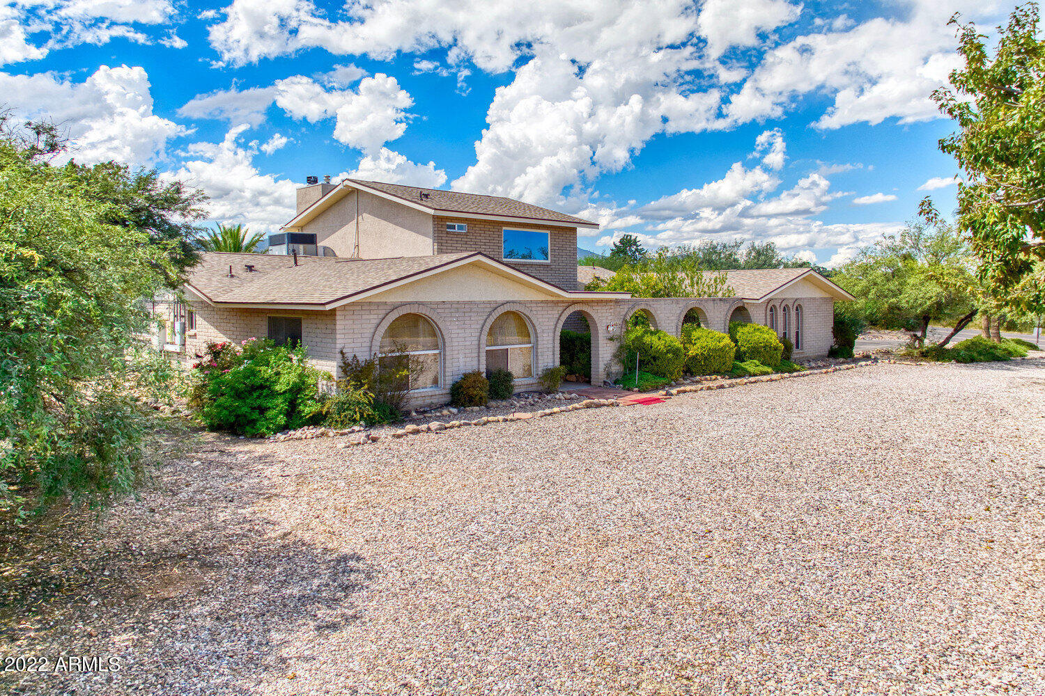 Custom built brick 3200+ sq. ft. home on well manicured landscaped 1+ acre fully fenced  lot with beautiful mountain views.  remolded kitchen w/ Stainless Steel appliances, Adjoining laundry/ storage room .Bonus Arizona room/game room .Study/home office area. Upstairs 4th bedroom/ studio  guest quarters with full bathroom and fireplace,. Primary remolded bathroom with jet tub, double sinks, and new cabinets. Enjoy your inviting Pebble Tech solar heated  swimming pool,4 person spa, Covered gazebo/Ramada  grill, seating area ,Great for  entertaining. Front garden courtyard perfect for quite sitting. Circular driveway. 2 Electric hot water heaters are solar supplemented  water softener.  home warranty in place. septic transferable warranty , new roof 2022 with 10 year transferable  warrant.