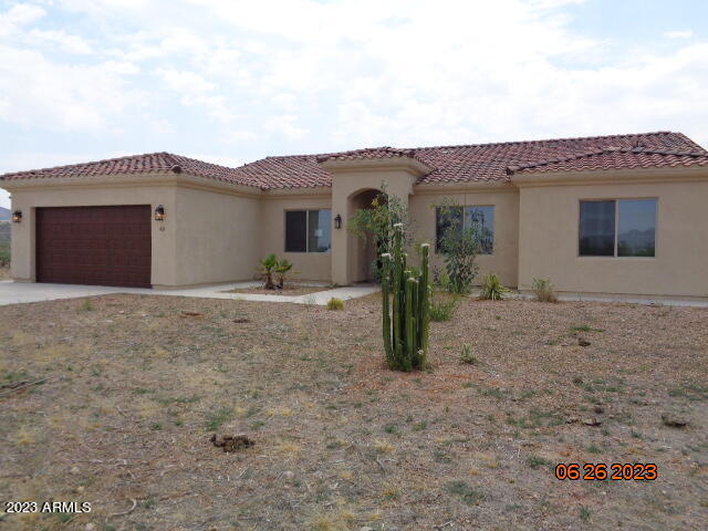 You will not find a nicer home for the money out there right now! This beautiful home features a highly upgraded kitchen with beautiful executive height cabinetry and granite counter and beautiful upgraded stainless appliances. There is a wonderful island with breakfast bar as well. The breakfast nook/dining has a bay that looks out the amazing mountain views to the south.  The home features a split plan that includes 2 secondary bedrooms with full bath and on the opposite side of the home, the master suite and laundry facilities. The master bedroom takes advantage of the amazing views and has a wall of windows that open to the back patio. The master bath includes a walk in shower, dual sinks and large walk in closet. Do not miss this home!