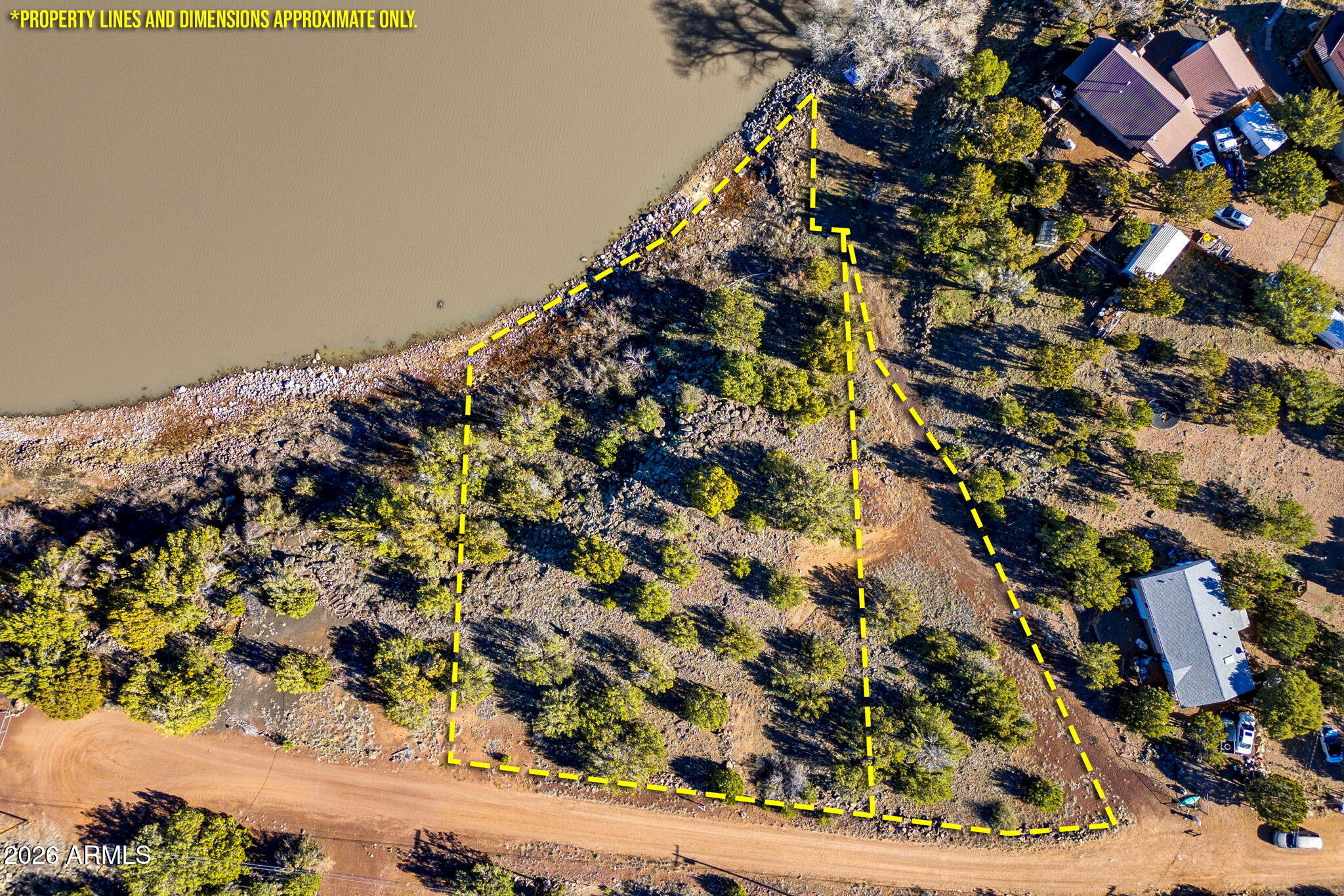 Build your custom mountain dream home on this incredible waterfront White Mountain Lakes property! With 1.18 acres, you'll have plenty of space to enjoy the privacy and serenity the area offers. With no HOA, there is tons of potential for any projects you can imagine! There is less and less lakefront land available by the day. Don't let this amazing opportunity pass you by.
*This sale includes both 1959 & 1963 Daggs Circle.*