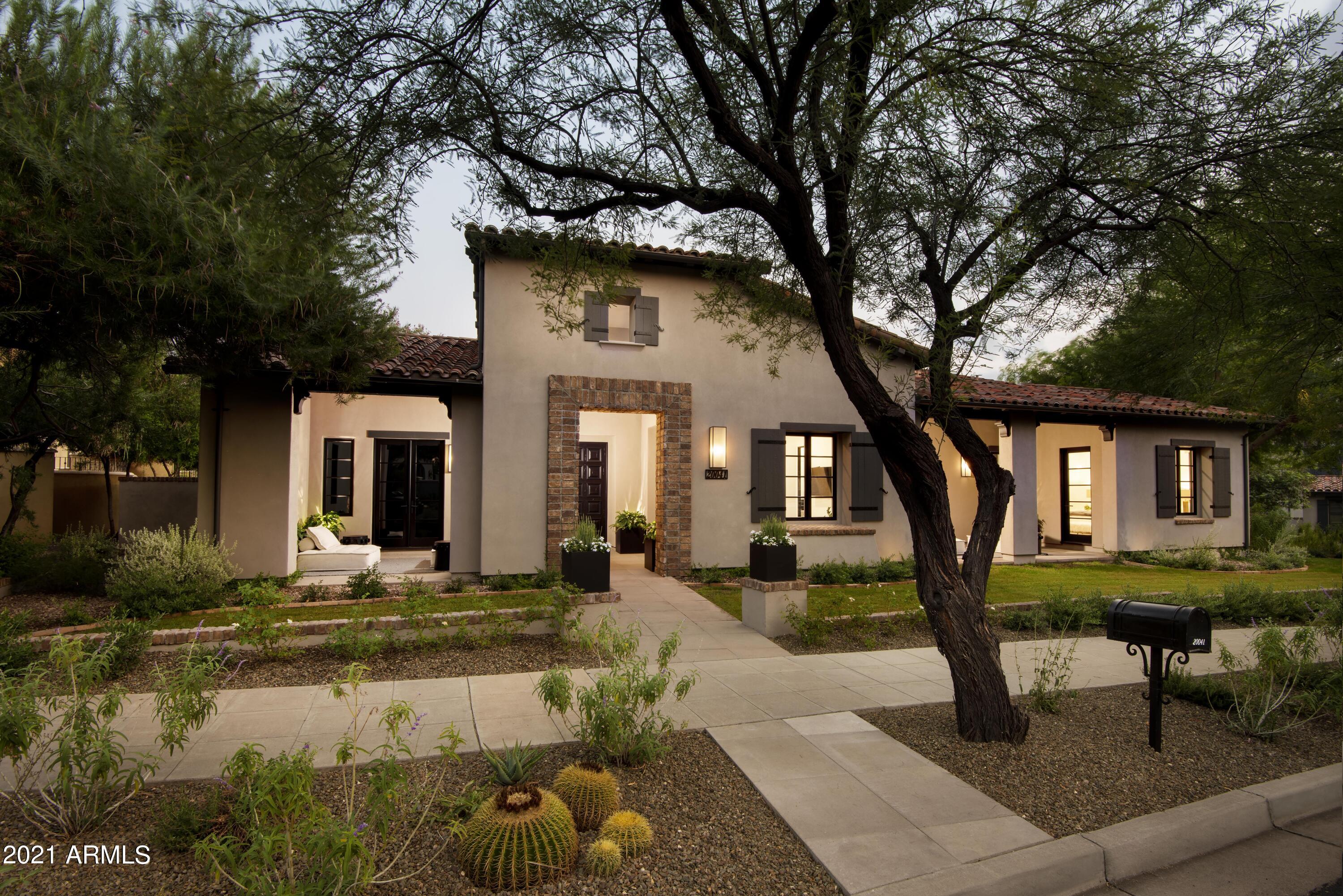 Completely remodeled by Ownby Design * This chic, contemporary home offers seamless indoor/outdoor living through a wall of glass to the remodeled pool/spa * Newly opened floor plan with kitchen to great room living, connected formal dining area with bar, overhauled master suite with walk-in shower with dual heads and outdoor shower off master with dual heads and a poured in place concrete tub * Hand-crafted details include rolled steel fireplace surrounds, all new wood plank flooring, signature vessel sinks and new, sound proof theater * New professional landscaping completes the residence *