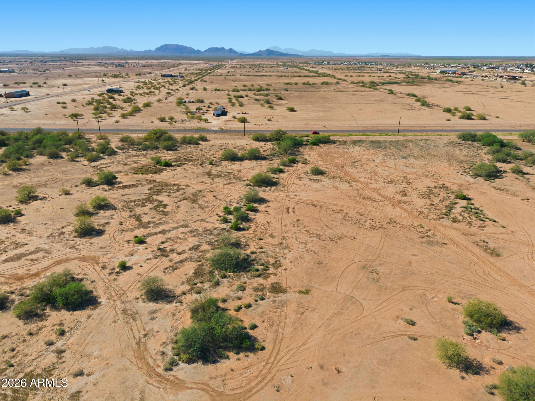 Great New Price! $59,000 for Two Side-by-Side 1-Acre Lots! Build your dream ranchette on these two 1-acre parcels offered together. Enjoy plenty of space for a custom home, horses, RVs, workshops, or outdoor living in a peaceful desert setting. Power is nearby, making development even more convenient. Located in rapidly growing Arizona City between Phoenix and Tucson, with quick access to I-10 and I-8, shopping, dining, and everyday amenities are within easy reach. No HOA restrictions mean the freedom to build and use the property your way. A fantastic opportunity for investment or your future homesite. Buyer to verify all material facts.