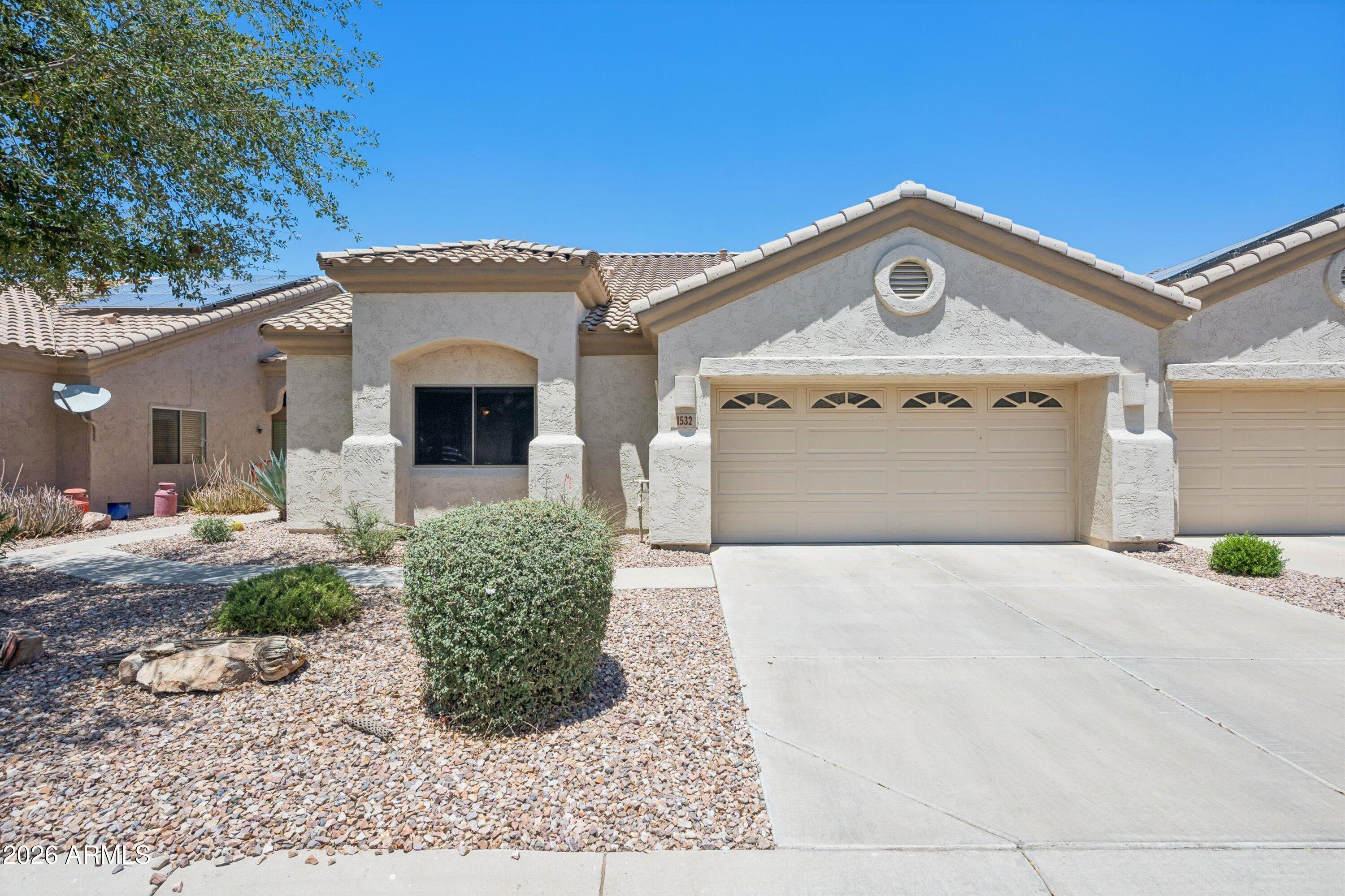 Tucked away on a quiet interior street within a gated 55+ community, this charming low-maintenance retreat offers the perfect balance of privacy, comfort, and vibrant community living. Step inside to a warm, welcoming interior filled with natural light, featuring hard-surface flooring throughout and a cozy electric fireplace that creates the perfect gathering space.

Out back, the private patio with pavers and a charming privacy wall sets the stage for peaceful mornings with coffee or relaxing evenings under Arizona's desert skies. A fully paid-off solar lease adds exceptional value and energy savings year-round.

Whether you're seeking a seasonal escape or a full-time residence, you'll love the serene atmosphere while still being just moments from the community pool, clubhouse and fit