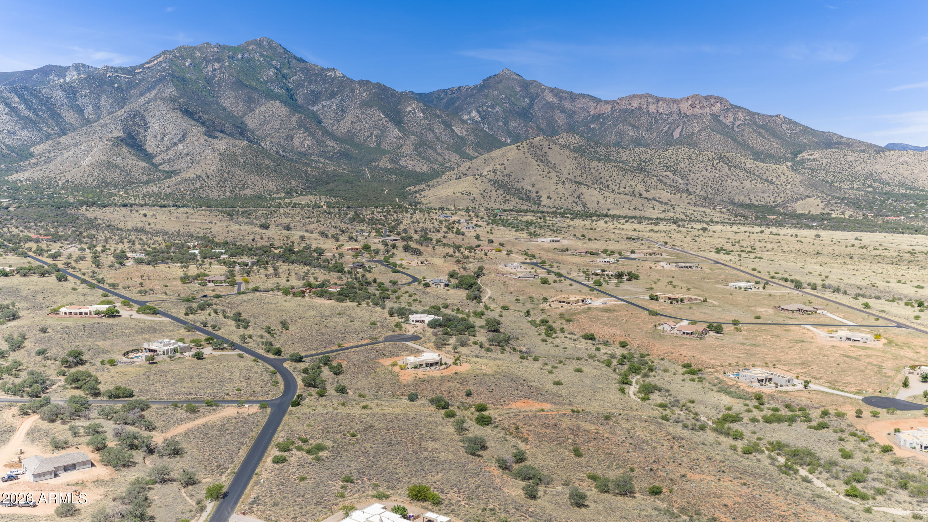 Build your custom home! Experience the quiet beauty of Southern Arizona with this stunning 3.597-acre homesite in the heart of Hereford, AZ. Nestled within an exclusive private gated community, this property offers the rare combination of picturesque serenity and elegant living. Surrounded by expansive estate homes on larger lots, the neighborhood reflects pride of ownership and an appreciation for space and privacy.
From sunrise to sunset, you'll enjoy unobstructed 360° views of rolling desert landscapes and the majestic Huachuca Mountains. At night, the dark, starlit sky creates the perfect setting for evening gatherings, outdoor entertaining, or peaceful stargazing. Experience the quiet beauty of Southern Arizona with this breathtaking 3.597-acre homesite in the heart of Hereford, AZ. Nestled within an exclusive private gated community, this property perfectly balances refined living with picturesque serenity. Surrounded by impressive estate homes on spacious lots, the neighborhood reflects pride of ownership and a true appreciation for privacy and open space.  

Awake each morning to the golden glow of a Hereford sunrise illuminating the Huachuca Mountains, and close each day with vivid sunsets that paint the desert sky in shades of crimson and gold. From dawn to dusk, you'll enjoy unobstructed 360° views of sweeping desert landscapes and majestic mountain backdrops. When night falls, the crystal-clear, starlit sky offers a peaceful retreat for stargazing or intimate evening gatherings--free from city lights so the Milky Way shines in all its glory.  

This exceptional parcel invites you to design and build your custom dream home, tailored to your lifestyle and vision. With abundant room for gardens, outdoor living areas, or even guest quarters, every detail can embrace the natural beauty that surrounds you.  

Discover the tranquility, freedom, and timeless desert charm that define Hereford living--where every sunrise is an invitation to dream, and every sunset is a reminder that you're home.
