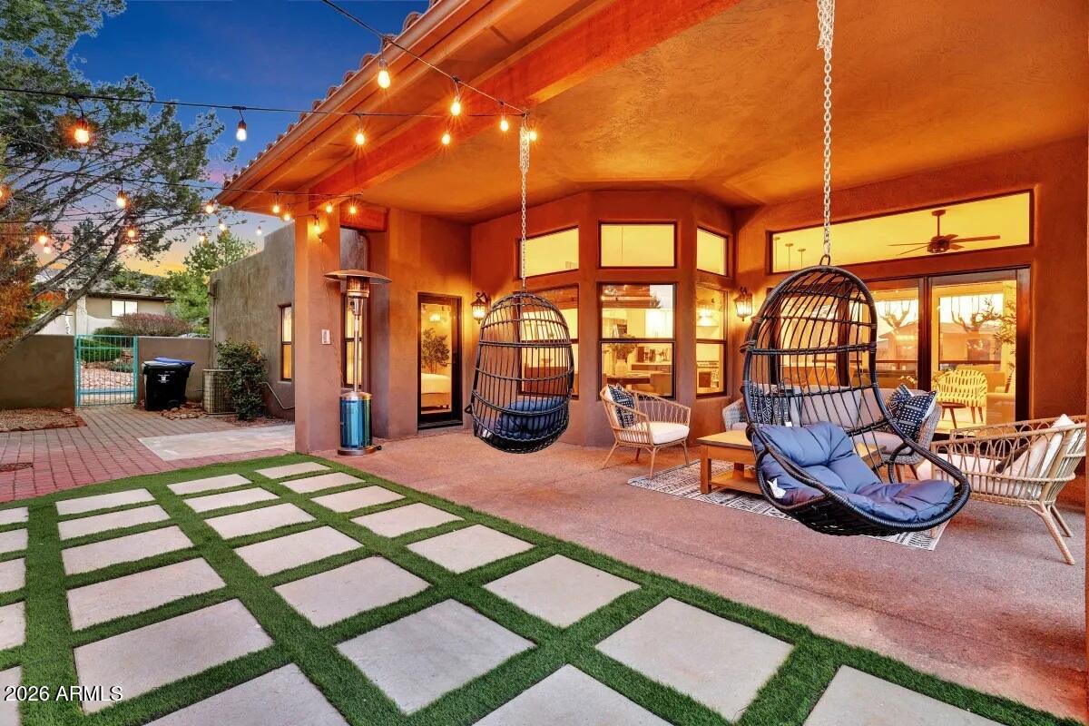 Experience the best of Sedona living in this beautifully renovated, turnkey retreat tucked away on a quiet cul-de-sac with no HOA. Offering 3 bedrooms, 2.5 bathrooms, and 2,305 square feet, this exceptional property blends luxury, comfort, and investment potential in one of Sedona's most desirable locations.

Thoughtfully updated throughout, the home features newer flooring, updated finishes, newer appliances, and spacious living areas designed for both everyday living and entertaining. The open floor plan creates a seamless flow between indoor and outdoor spaces, allowing you to fully embrace Sedona's breathtaking surroundings. Step outside to your own private resort-style backyard. Designed for relaxation and memorable gatherings, the outdoor space features lush turf, extensive paver patios, a hot tub, fire pit, swing, and multiple seating areas that invite you to enjoy Sedona's year-round sunshine and spectacular starlit skies.

Whether you're searching for a primary residence, second home, or investment opportunity, this property delivers. With a proven and successful short-term rental history, it offers the flexibility and income potential that today's buyers are seeking.

Recent improvements provide peace of mind, including a fully repaired roof with a 10-year warranty, newer HVAC system and water heater, newer appliances, and numerous upgrades throughout the home.

Ideally located just minutes from Sedona's renowned hiking and biking trails, world-class dining, shopping, art galleries, and outdoor recreation, this is a rare opportunity to own a fully renovated Sedona retreat that is as functional as it is beautiful.