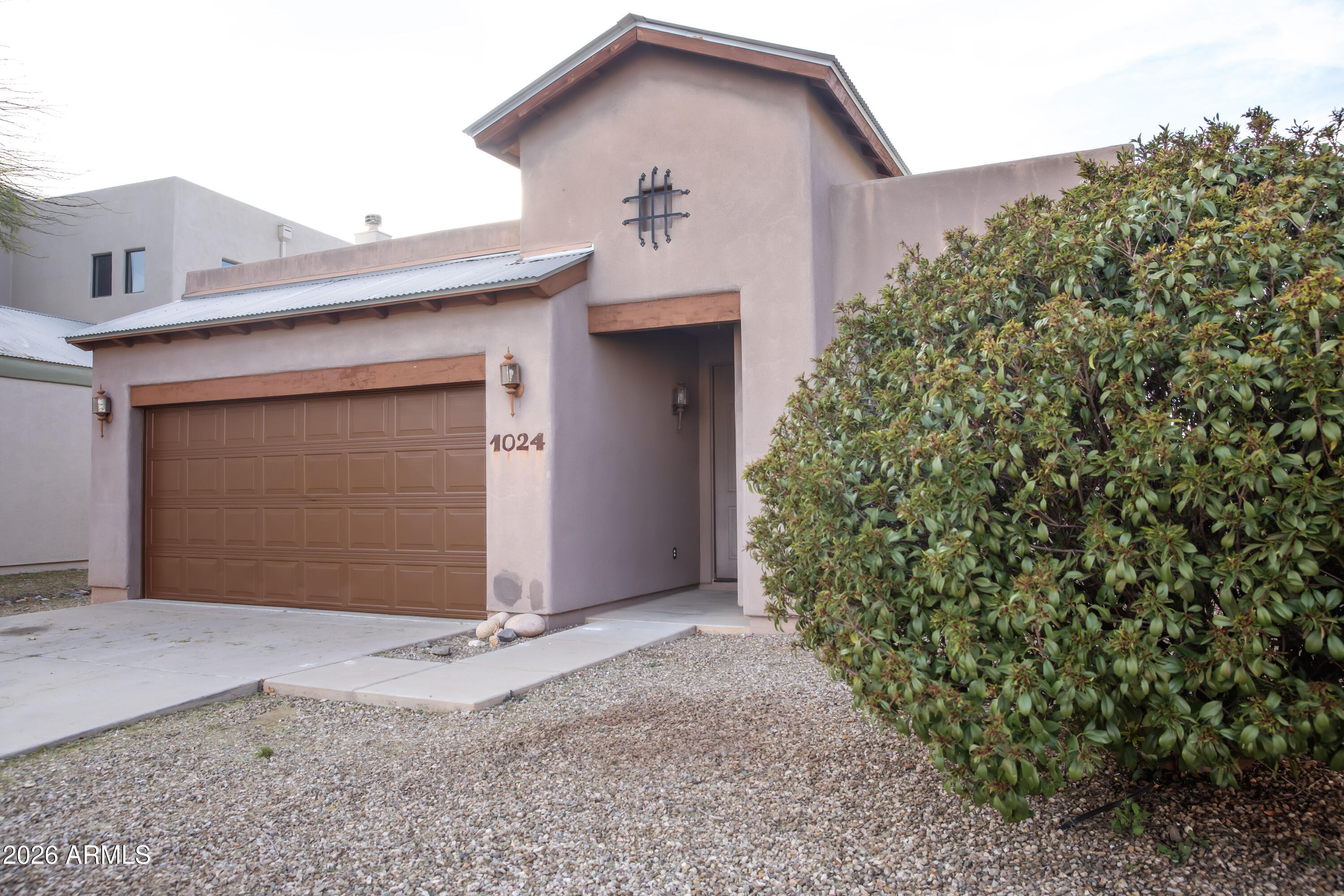 Discover easy desert living in Reflections Valiente--this single-level 3 bedroom, 3 bathroom home with an office/flex room delivers space, comfort, and a super convenient location minutes from Ft. Huachuca, shopping, dining, and services along Fry Blvd and Highway 90.

Step into an open great room that flows into the kitchen, creating a bright, comfortable space for everyday living and entertaining. The kitchen offers a handy buffet counter, generous cabinet storage, and hard-surface flooring in the main areas for low-maintenance, high-traffic durability. The split primary suite gives you extra privacy with an en suite bath, walk-in closet, and an attached office/flex room--perfect for working from home, a home gym, playroom, craft space, or media room. Two additional bedrooms and bathrooms provide plenty of room for family, guests, or a housemate situation. Outside, enjoy stucco construction, a block-walled backyard, gravel/stone landscaping, and a storage shed for your extra gear, plus central A/C with gas heat to keep you comfortable year-round. All of this in Reflections Valiente, close to Ft. Huachuca, schools, parks, and everyday conveniences, makes this home an easy choice for buyers looking for single-level living in the heart of Sierra Vista.