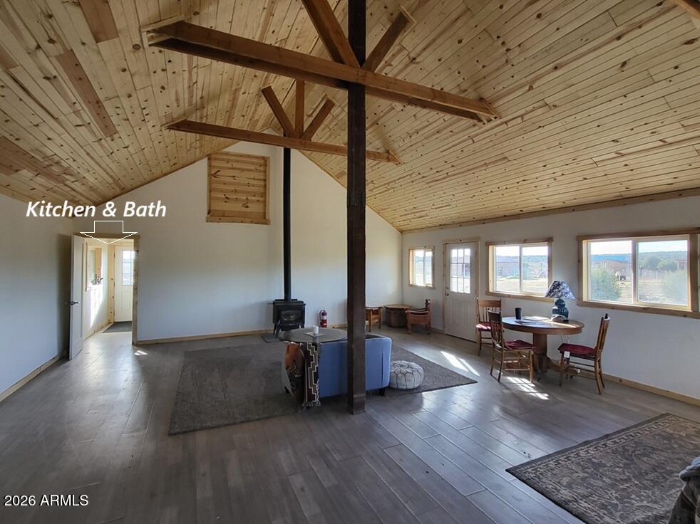 Ranch Ready - 47 acres - Owner will consider financing with 50% down. Off-Grid & Fully Fenced, Separately fenced corrals, 24X32 Barn, 16X16 Sheep Barn, 960 sq ft Cabin 90% open for your custom design. 10X20 Studio. 20X40 Carport, 2 Solar Buildings power the property, plus 17k gallons of water storage with 2,000 sq ft of water harvesting capacity. Approximately 19 acres of meadow with the balance treed in Juniper with views of San Francisco Peaks, Mount Floyd and Round Mountain. A natural watershed runs through property with a stock tank in place. Raised garden beds surround the Cabin. Includes three containers, a large RV for storage and a tiny house tucked in the trees. Westwood Ranch Development maintains the main roads. No HOA. A must-see ranch opportunity !