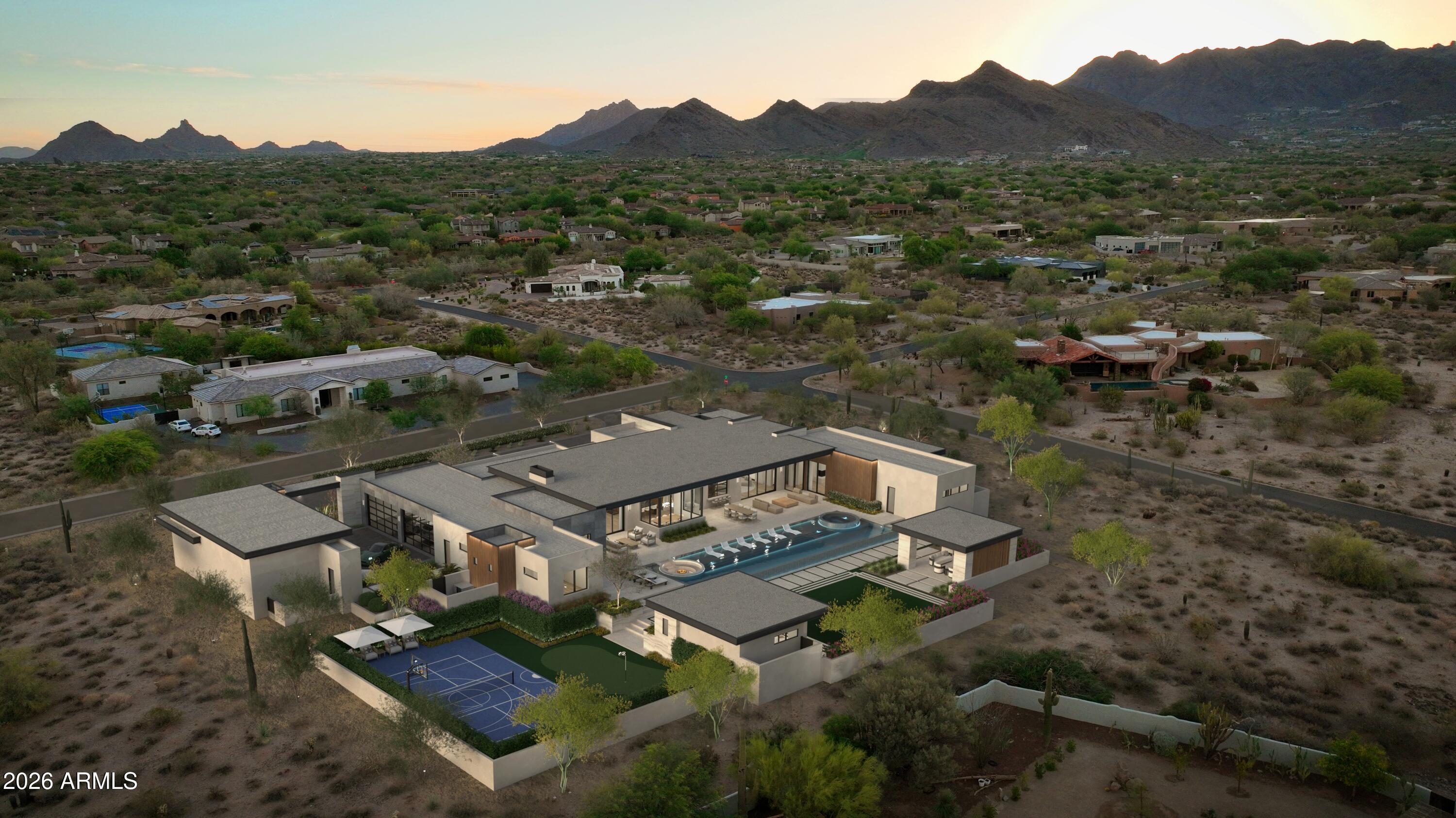 VANQUISH by OUD is a new construction, single-level soft-modern estate set on over 1.5 acres in Pima Acres with sweeping mountain and desert views.

Purposefully developed and designed by OUD, the residence offers 6 bedrooms and 8 bathrooms across 9,112 total livable square feet between the main residence and detached guest house, blending warm contemporary architecture with a highly livable, resort-inspired layout.

Designed around the idea of elevated everyday living, the home features a private office, dedicated wellness suite, and a fully appointed butler's kitchen with secondary prep, storage, and service areas that effortlessly support both intimate daily living and large-scale entertaining.

Expansive walls of glass dissolve the boundary between indoors and out, opening to a dramatic backyard retreat complete with an infinity-edge pool and spa, Baja shelf, sunken fire lounge, covered patios, outdoor kitchen, and dedicated pool bath, all framed by the surrounding mountain and desert landscape.

Car enthusiasts will appreciate the fully air-conditioned 8-car garage and expansive motor court, creating a true automotive showcase designed for Scottsdale's collector and enthusiast lifestyle.
Every detail was intentionally curated through OUD's signature design lens: warm natural materials, layered lighting, architectural fire features, and a refined palette that balances softness, scale, and modern sophistication. Advanced DMF lighting was thoughtfully integrated throughout the home to support circadian rhythm and create a more natural, wellness-oriented living experience from day to night.

Located near North Scottsdale's premier golf, dining, and lifestyle destinations, VANQUISH represents OUD's third signature spec residence in Pima Acres and our most ambitious expression to date.

Estimated completion: Summer 2027
