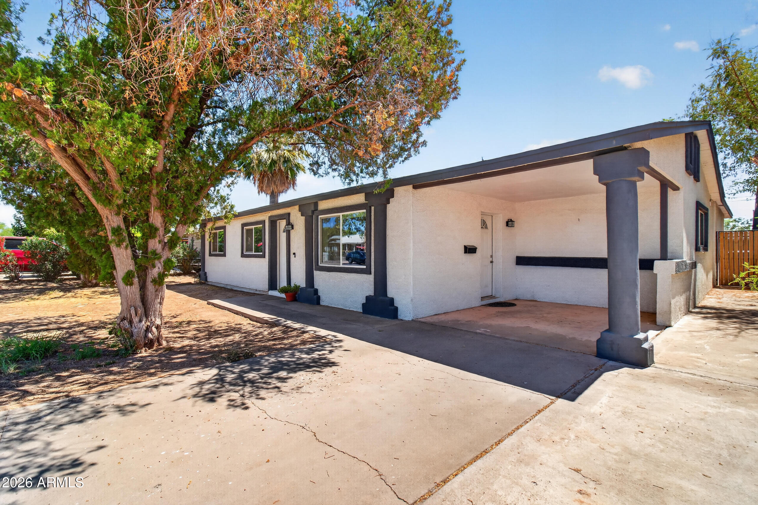 Some homes check boxes. This one opens doors. Tucked in a central, Arcadia-adjacent neighborhood just minutes from Papago Park and the Desert Botanical Garden, this beautifully remodeled single-level home blends mid-century character with crisp modern finishes and no HOA to answer to. Inside, vaulted ceilings and an open split floor plan create a bright, easy-living feel across three bedrooms, three baths, and a versatile den. The kitchen is made for gathering, with a large island, breakfast bar, and pantry. The primary suite offers a private escape with separate sleeping and sitting/dressing areas. The backyard? A clean slate  plenty of room for a pool, casita, ADU, or the outdoor entertaining setup you've been planning. With Sky Harbor, downtown, Old Town Scottsdale, and Tempe/ASU all within ten minutes  and the 202 and SR-51 right around the corner  you're connected to everything while still tucked into one of Phoenix's most desirable pockets.