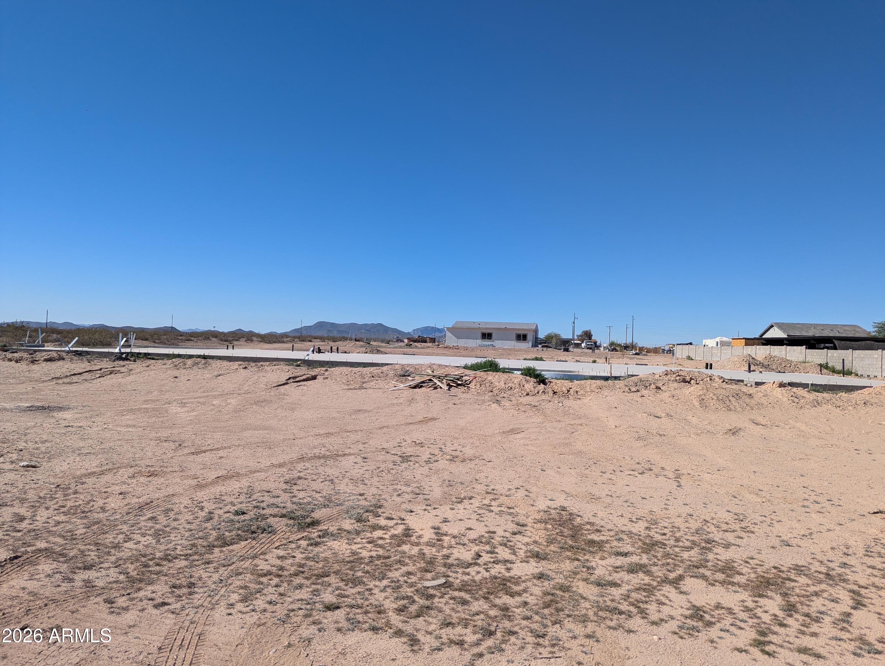 Your Dream Oasis awaits you! 1+ Acre lot already has approved plans for a 2932sq ft 4Bed/3.5Bath Main House and a 1108sq ft 2Bed/2Bath Guest House. Slabs are already poured and rough-in plumbing and septic installed, water on site with private water co. and power available at corner of property line.