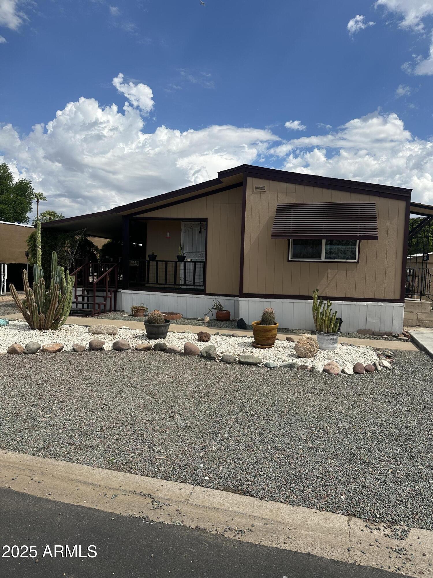 Welcome Home! This double wide manufactured home, built in 1973 and measuring 24 x 52 offers a large living space and welcoming covered patio deck, great for outdoor BBQ or morning coffee. Recent upgrades include all new master bathroom, complete with Tile shower and double vanity, new faucets and new tile flooring. New Roof 2024, All new Pex water lines 2024, Exterior New siding 2023 and Freshly painted exterior 2025. New Windows 2023 and inside drywall with the exception of kitchen and hall bath. Two outdoor storage sheds and a 2 car concrete driveway! The community offers an array of amenities, including a refreshing swimming pool and clubhouse equipped with kitchen and sauna, horseshoes, shuffleboard, a billiard room, laundry facilities and Fitness center