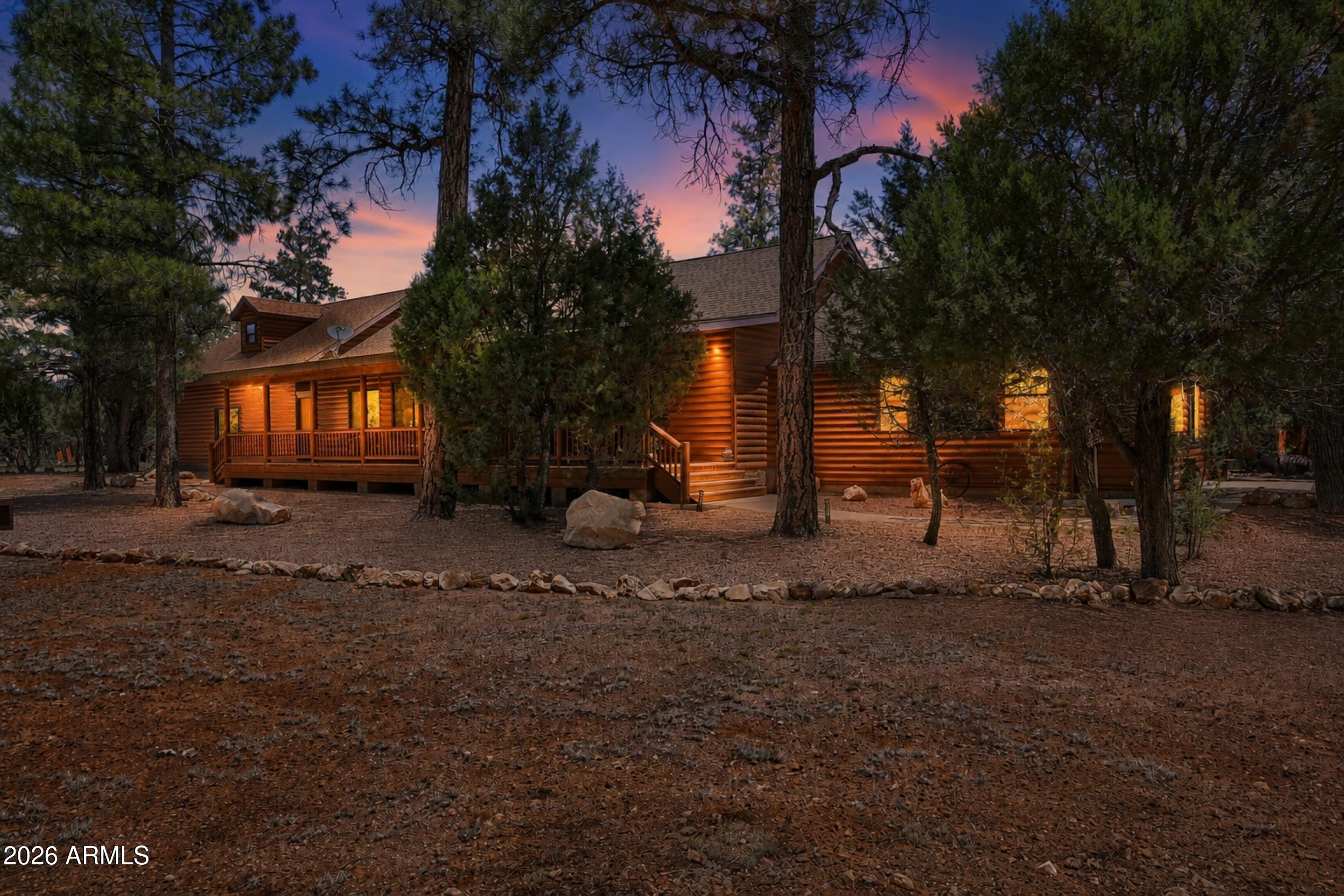 Ready for relaxation at its best? Step inside this beautiful SINGLE level home in Happy Jack.  This home offers 3 bdrm/2 bath split floor plan. Open floor plan with large kitchen and separate dining area great for entertaining. Lots of alder cabinets, off the kitchen there is a pantry and laundry room. A large open living room as well as a family room or gameroom on the other side of home.  The home offers beautiful T&G ceilings and a cozy wood fireplace  while the family room has two steps down to a large room for entertaining, wood accents and a electric fireplace . Both front and back have a great covered deck to sit and watch the wildlife, great for BBQ and more. The oversized newer garage is detached but attached to the home by a covered breezeway. The garage is perfect for a manMORE cave, plenty of room for workshop and upstairs has an open canvas, office, hobby room, addl living area(if county approves) so much potential. The lot is beautifully manicured and offers 3 addl sheds for storage. Don't miss this great retirement, full time or weekend escape.